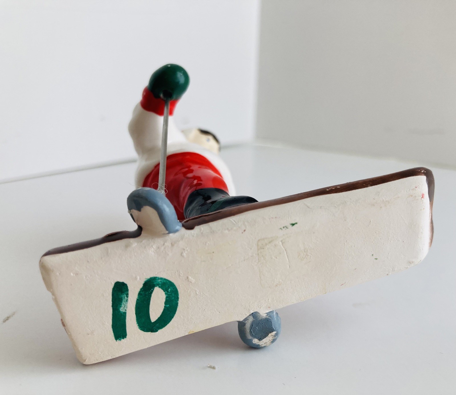 Department 56 Snow Village Children on Toboggan Sled and Skier ceramic figurines