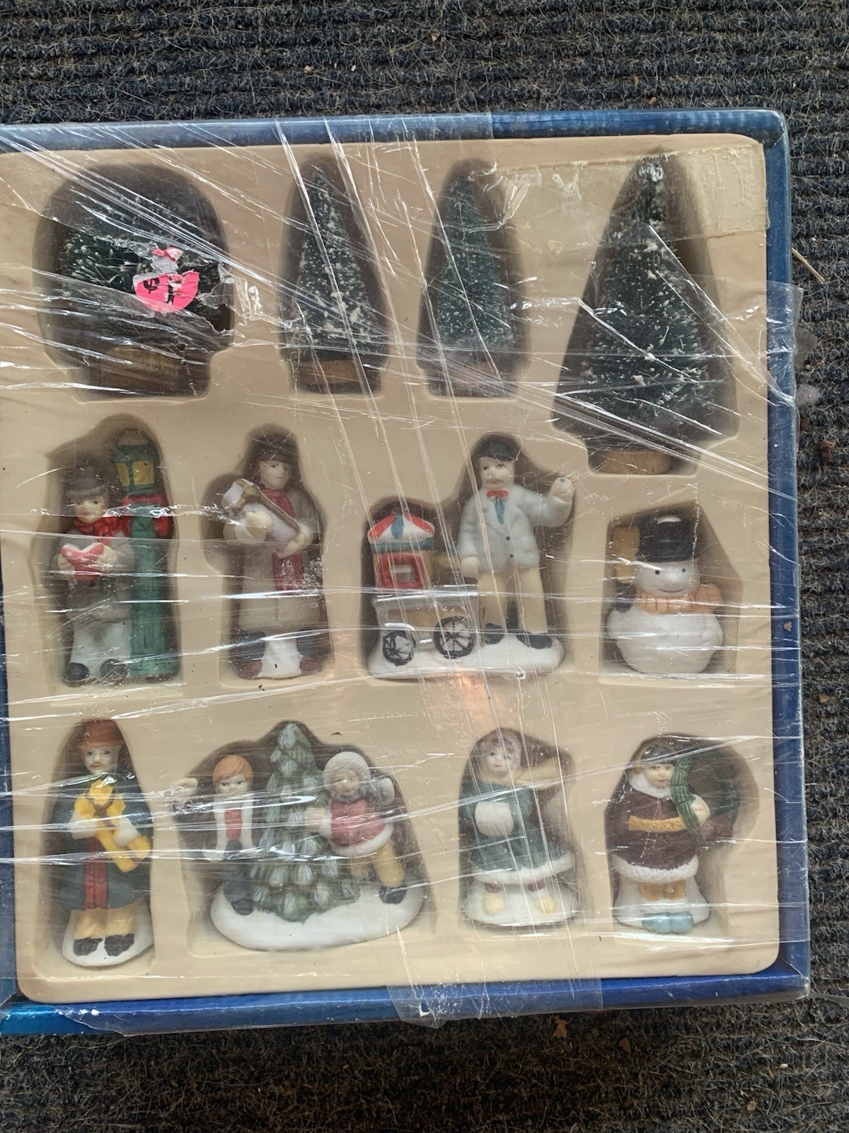 Atico 12 Piece Winter Village Set – Porcelain Figure 1¾” – 3″ Tall & Sisal Trees