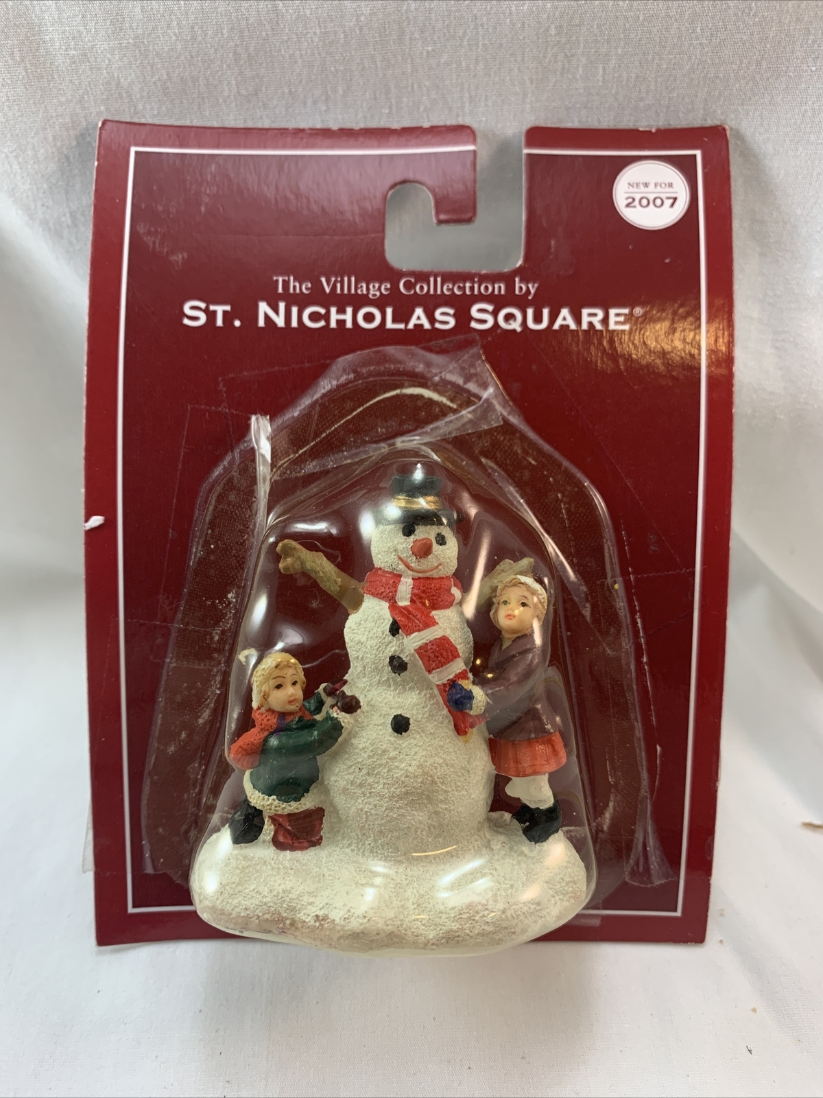 The Village Collection St. Nicholas Square Snowman With Children 2.5”