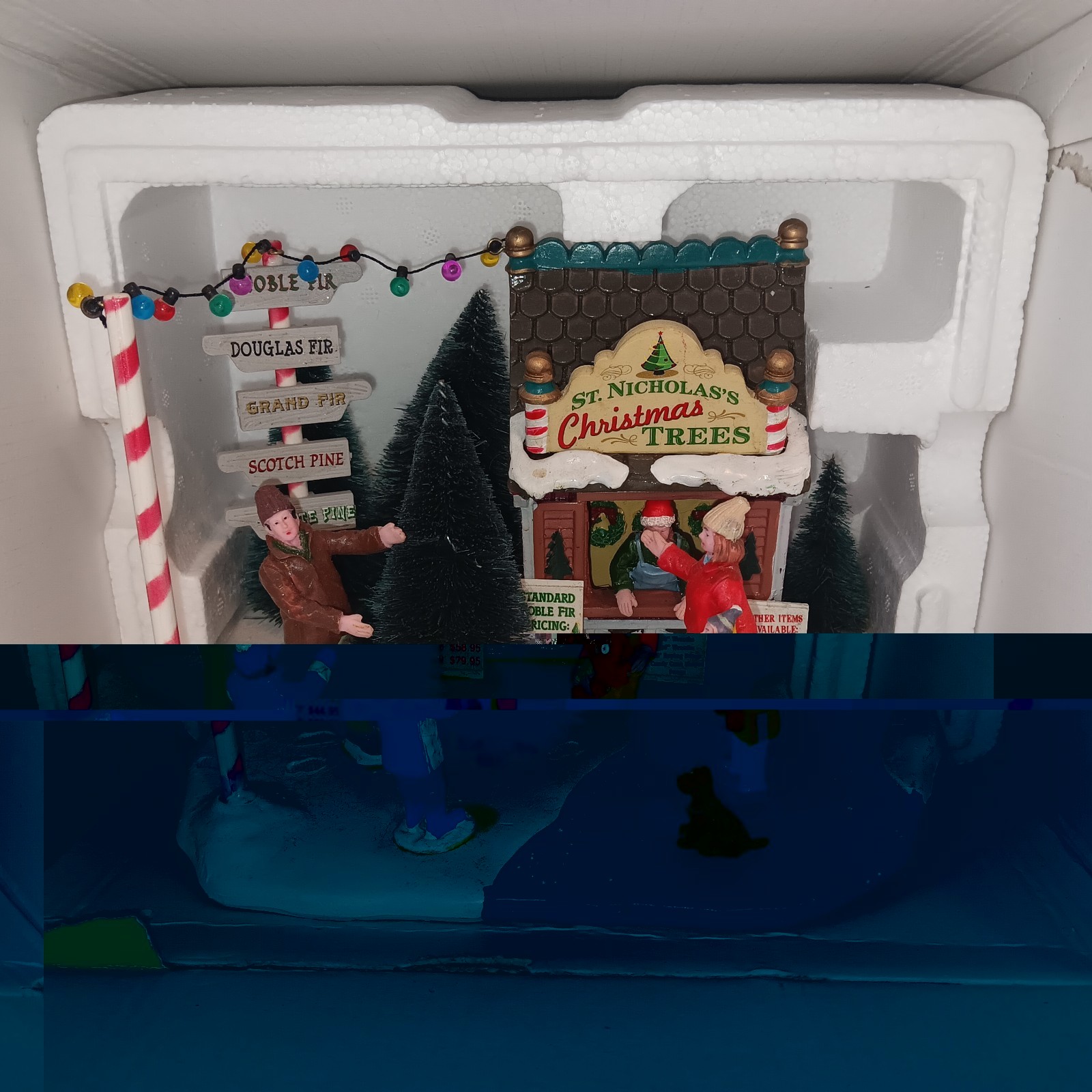 LEMAX St. Nicholas’s Tree Lot 3D Village Family Christmas Scene
