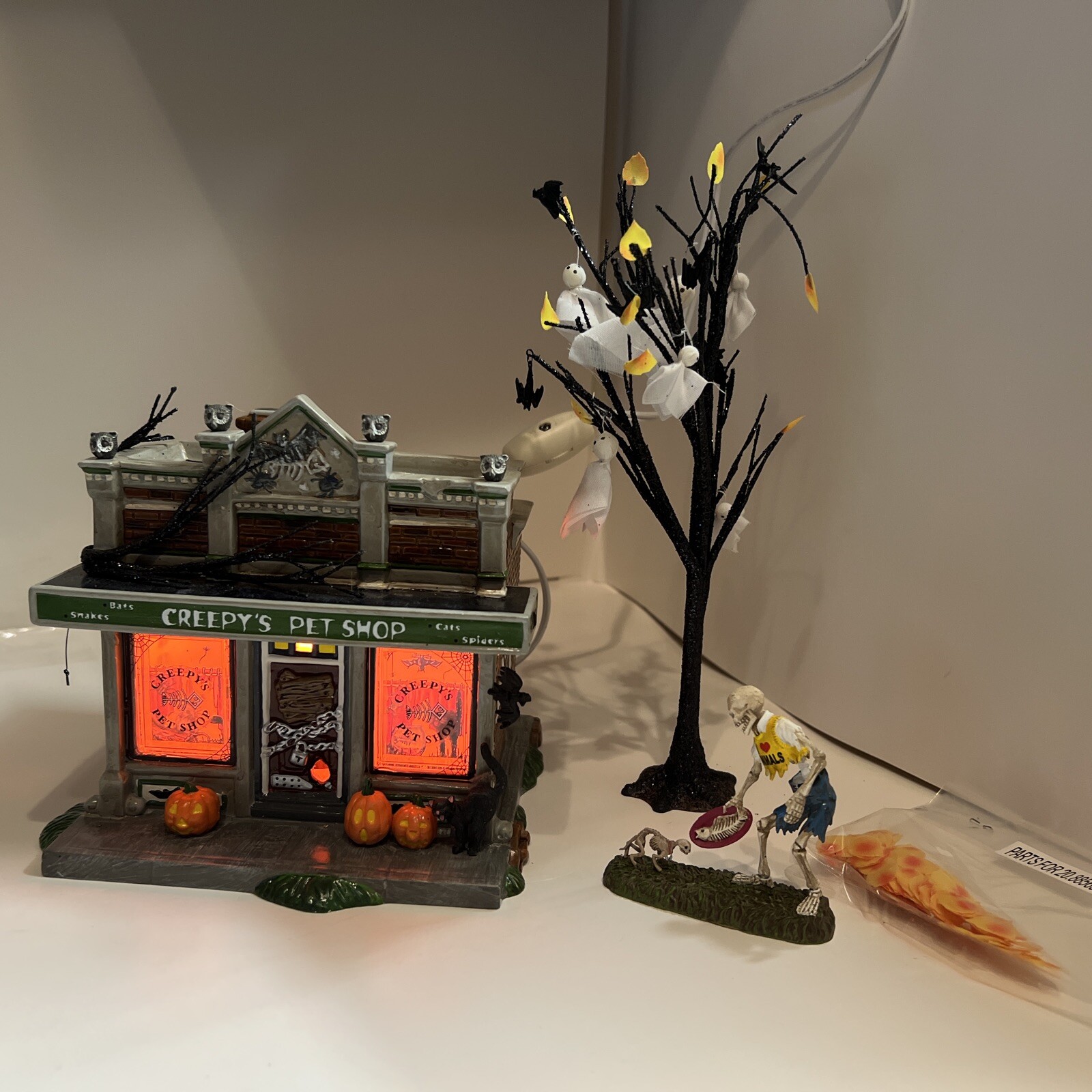 Department 56 Creepy’s Pet Shop 20.88569 Set of 4 Time To Celebrate
