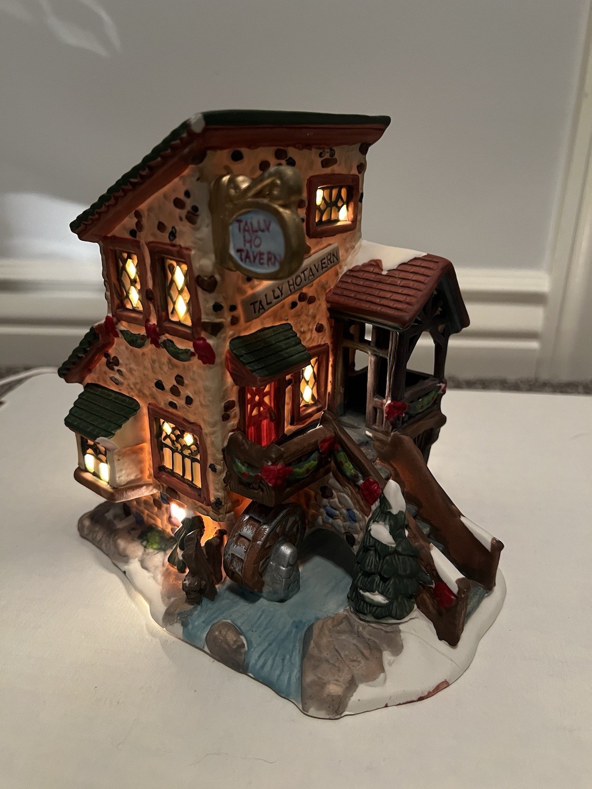 Christmas Streets Tally Ho Tavern 1999 lighted building Village With Cable