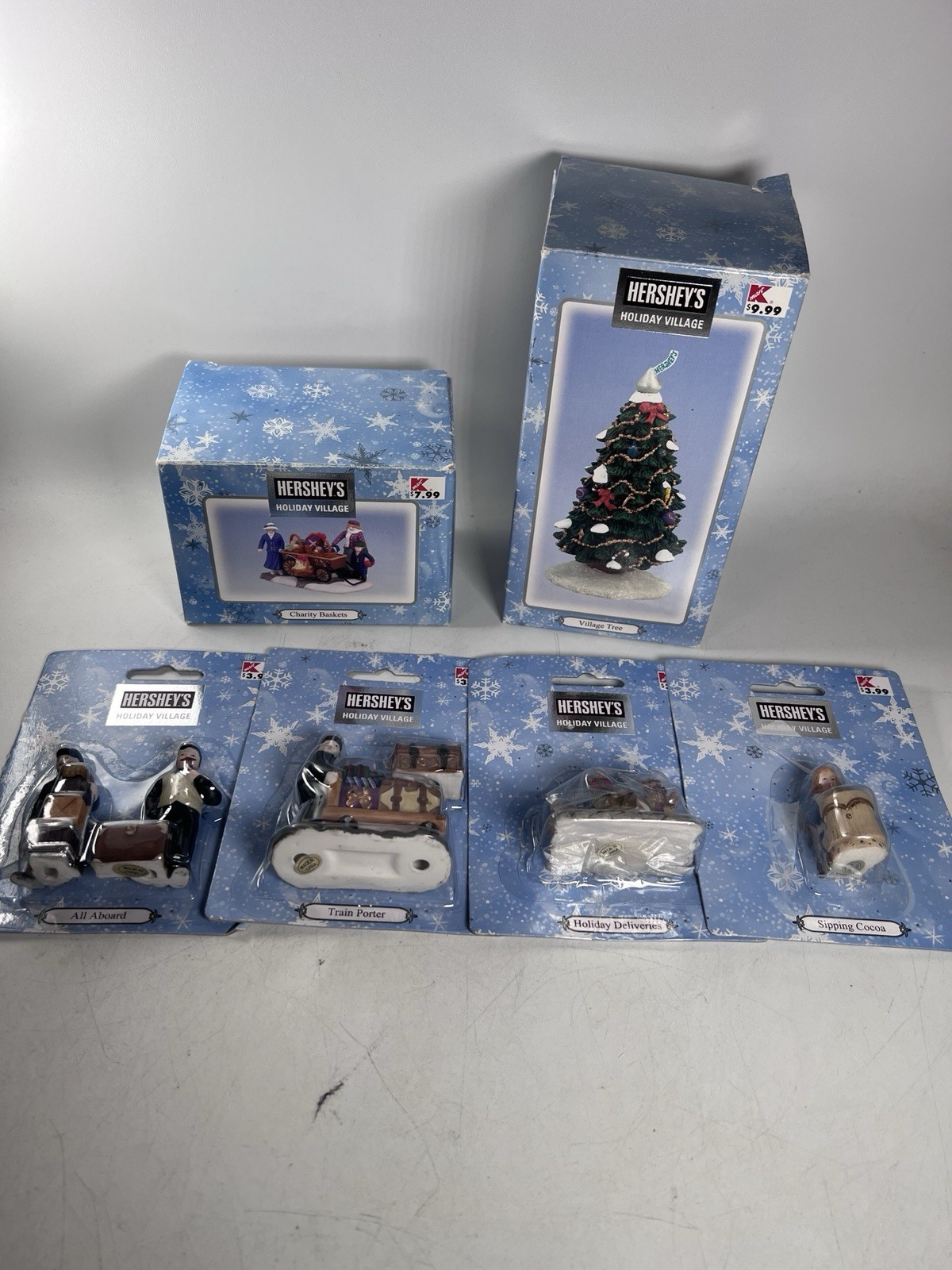 5 Hershey’s Holiday Village Pieces Village Tree Charity Baskets Train Porter