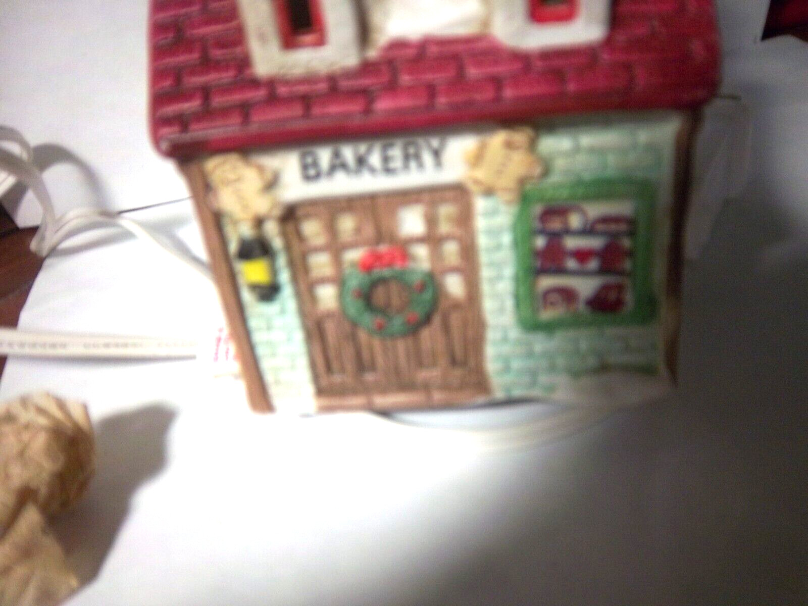 Lighted Xmas “Bakery”shop with dormers-Window displays breads,cake ,cookies-