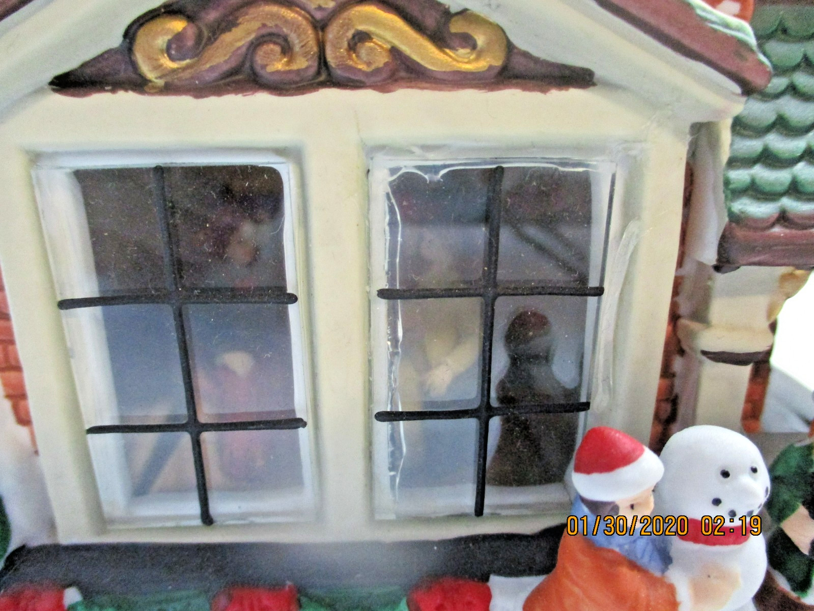 Vintage Trim A Home Country House with Lit Interior Scene & Trees