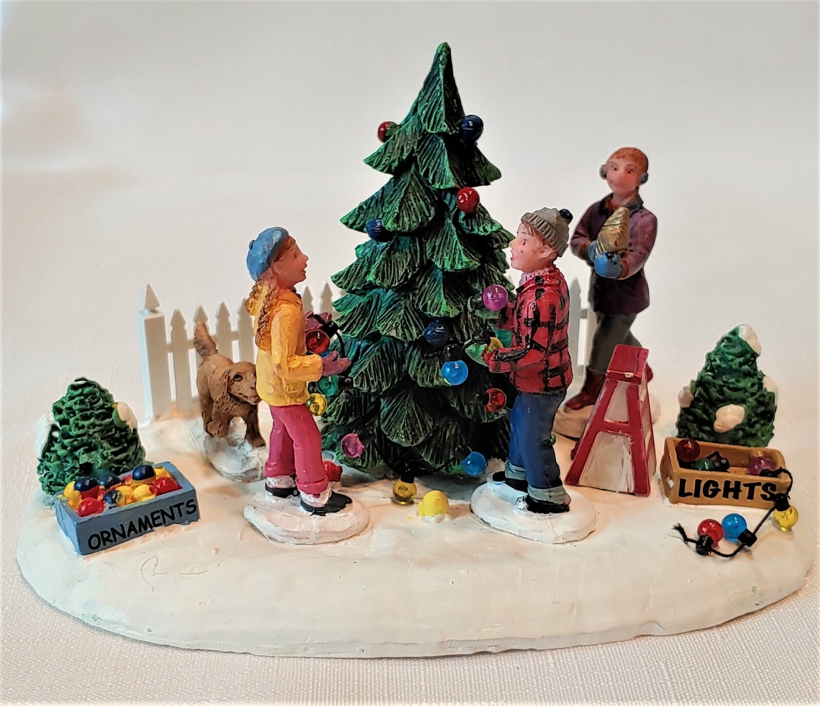 Christmas Village “Decorating The Tree”