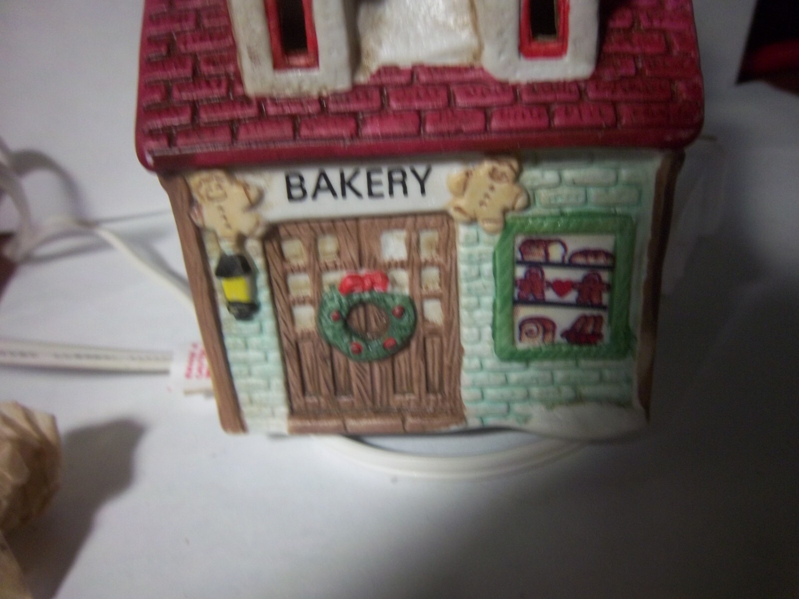 Lighted Xmas “Bakery”shop with dormers-Window displays breads,cake ,cookies-