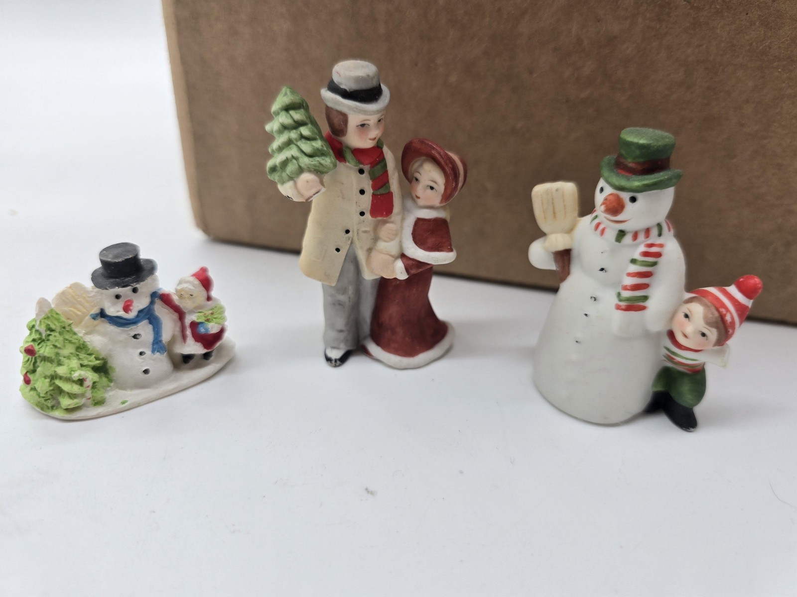 Unmarked Christmas Village Resin Figures Set 4 Snowmen Tree Flag Patriotic Decor