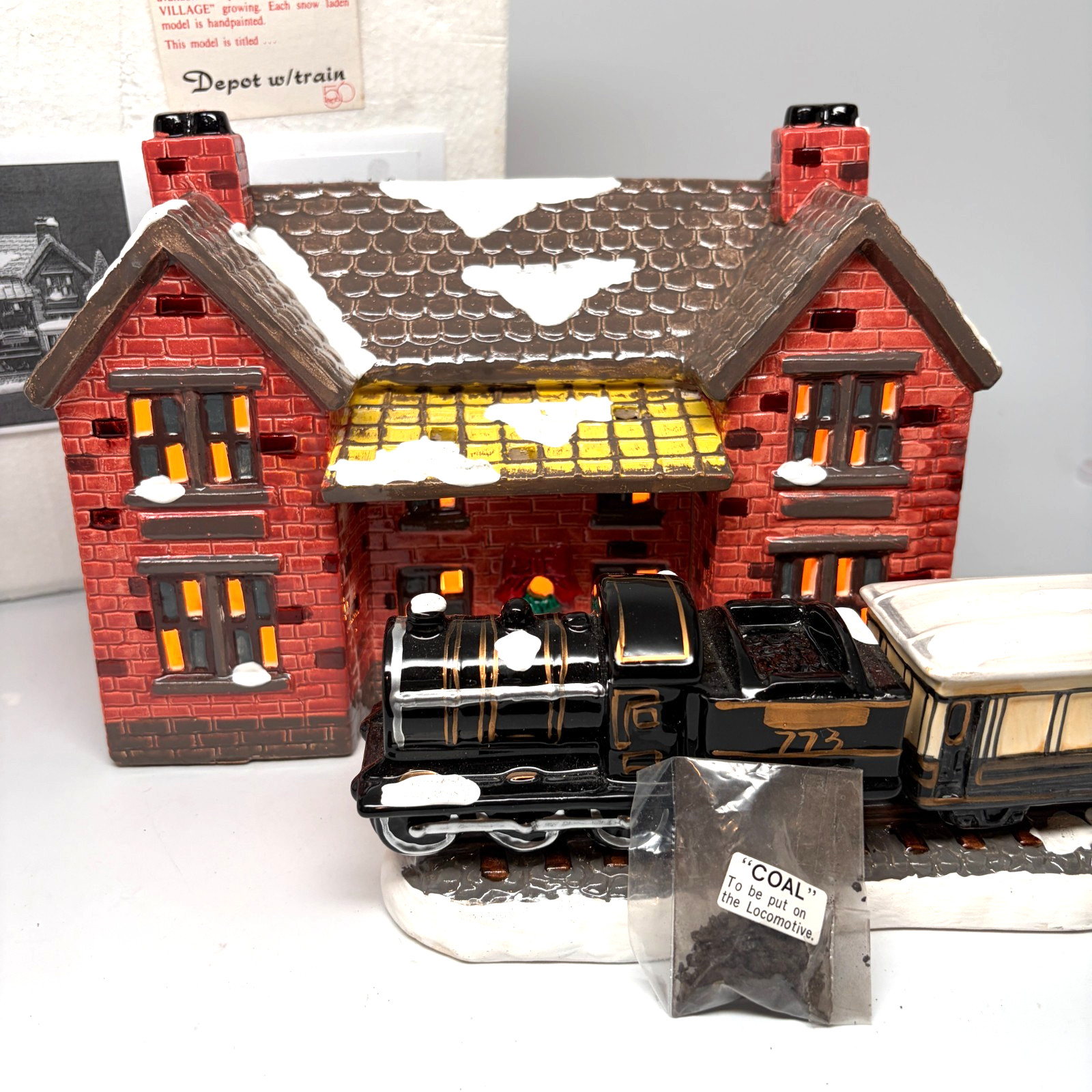 Dept 56 Snow Village 1986 Depot with Train, has light, bag of coal, & hangtag,