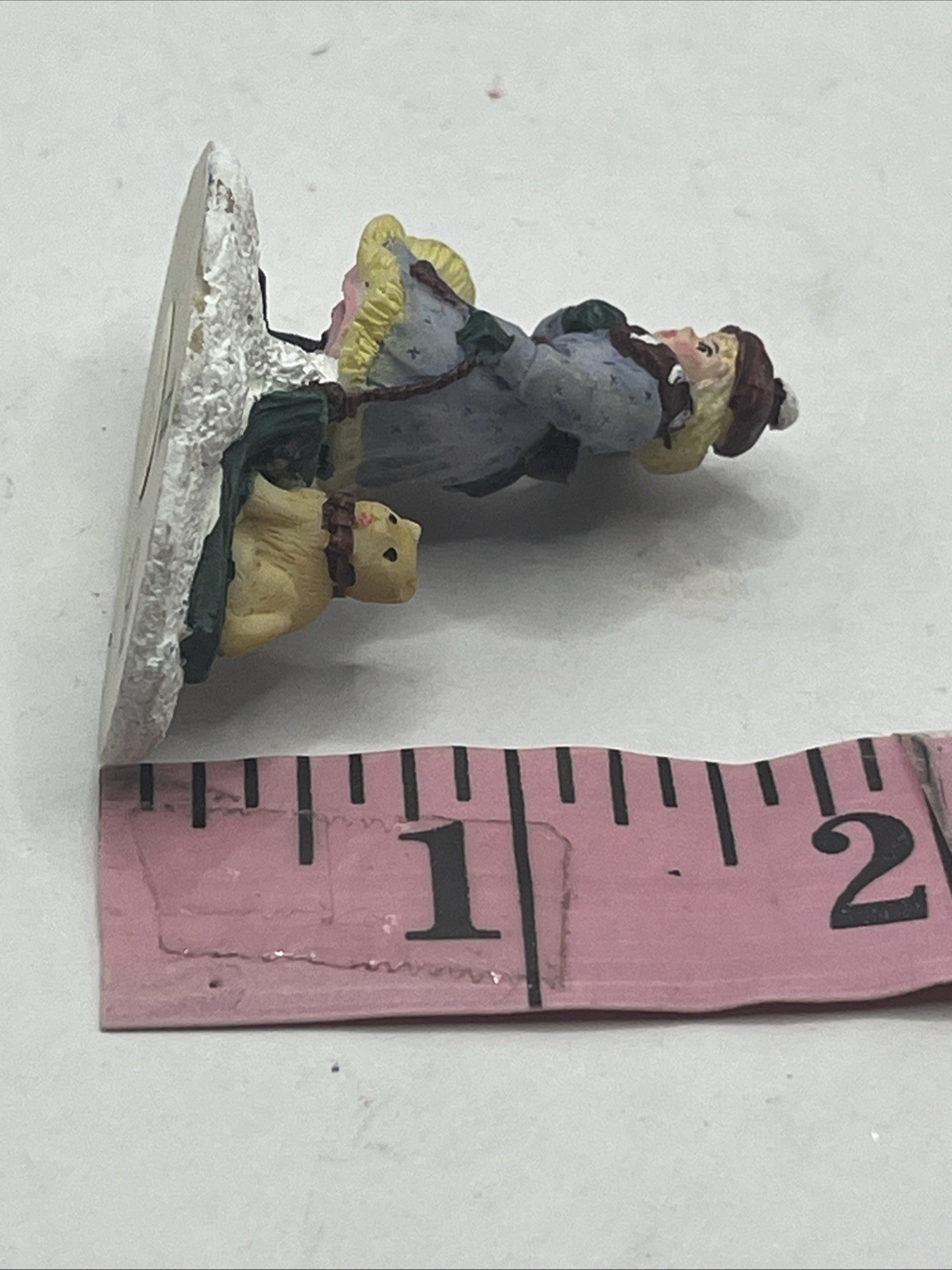 Vintage Mervyn’s Christmas Village Square figurine Girl Pulling Sled With Dog On