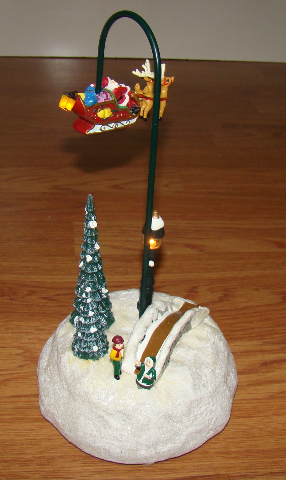 2007 St. Nicholas Square Village FLYING SANTA Hand-Painted, Lighted, Motion