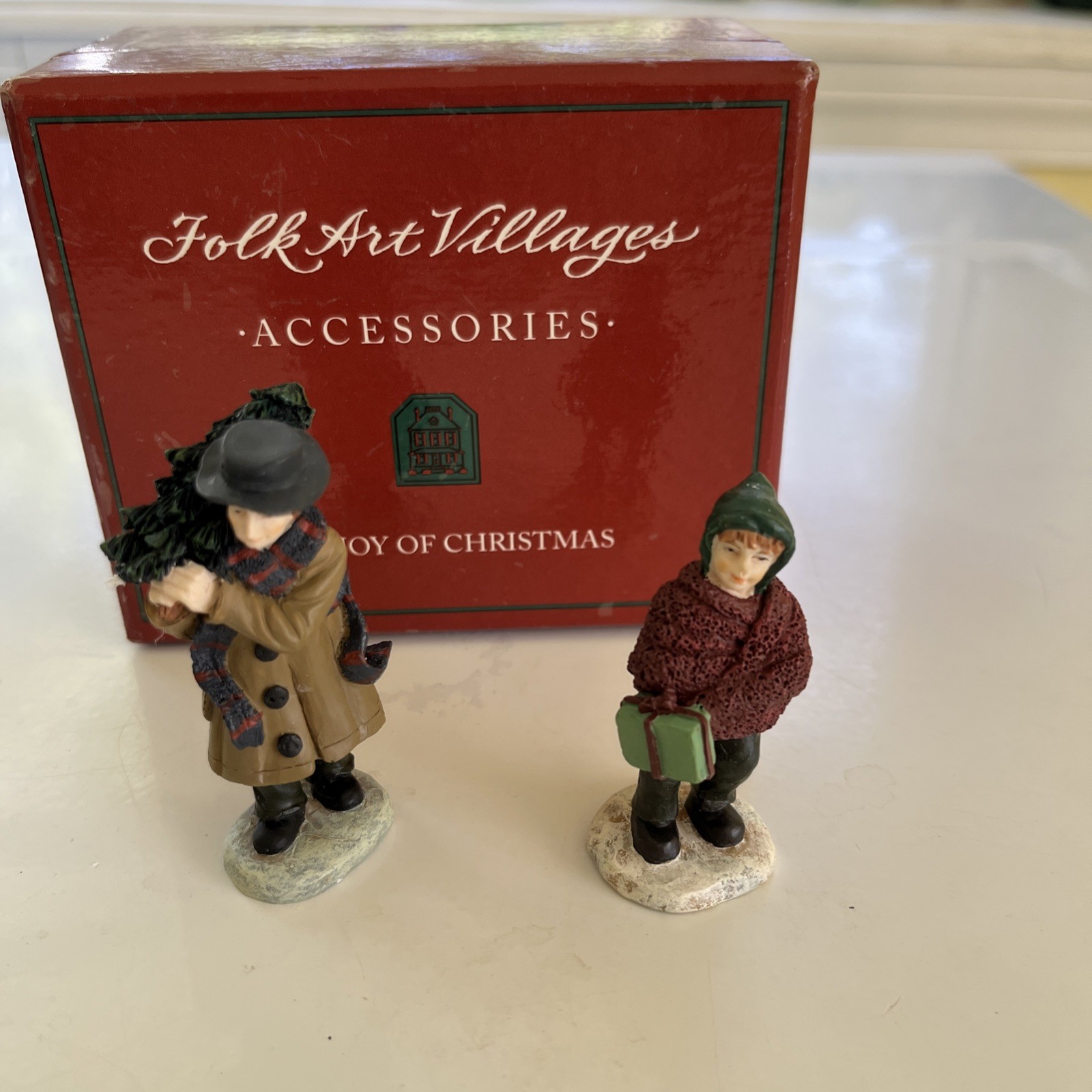 Lang & Wise Joy of Christmas Man Carrying Tree & Woman Holding Present 30010604