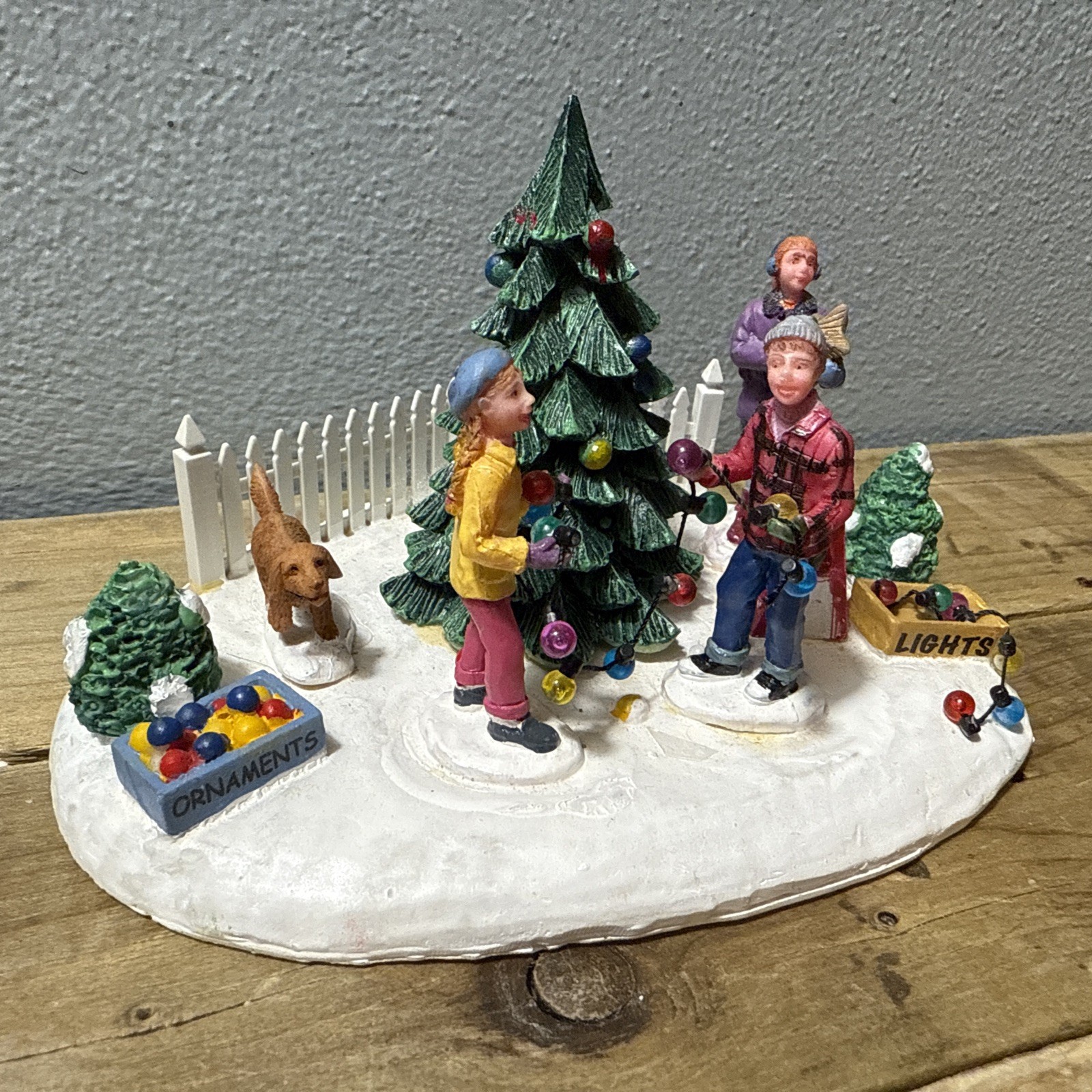 2009 Lemax Christmas Carole Towne Collection: Decorating Front Yard Tree, #94056