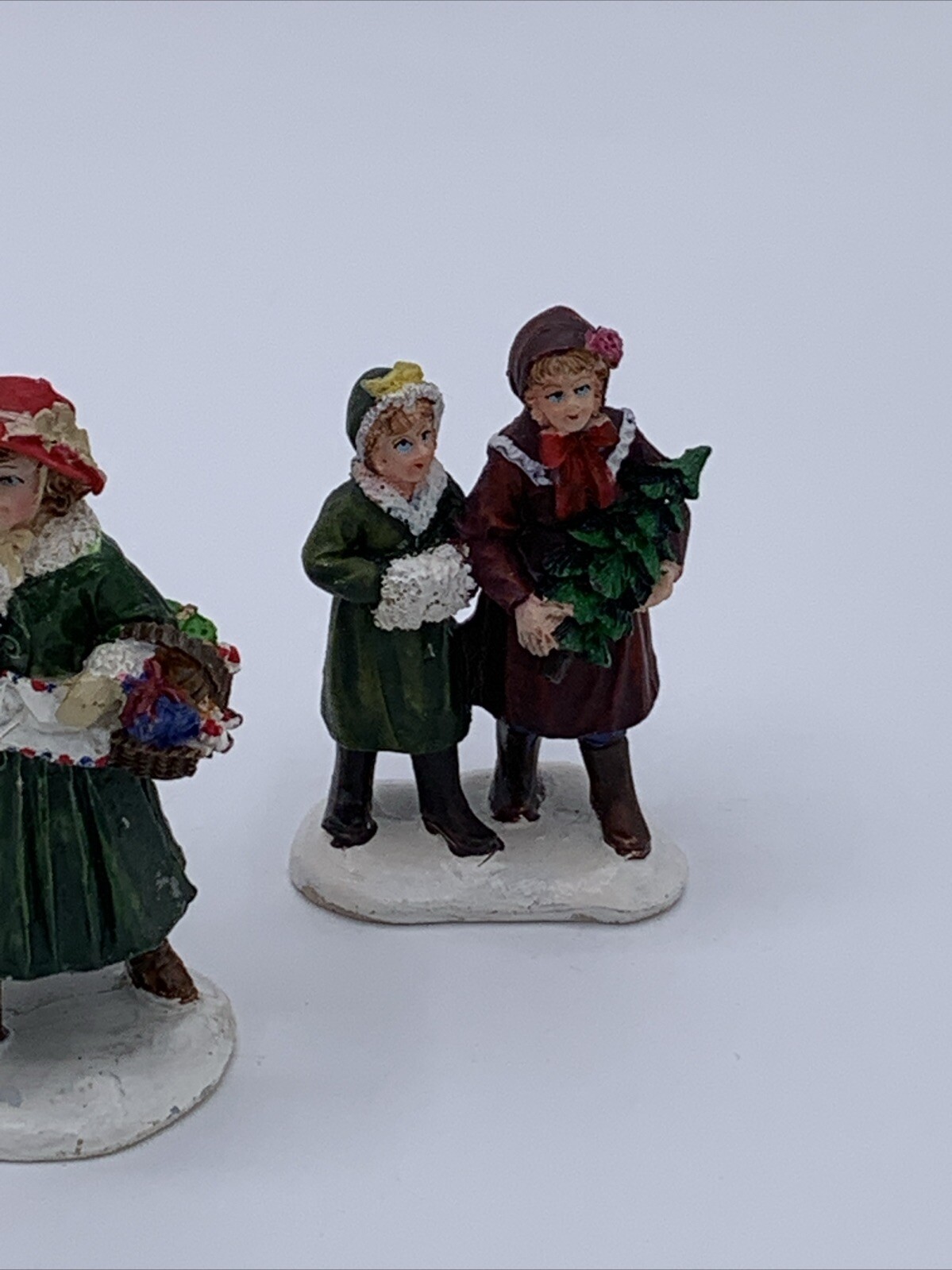 Lot of 3 Unbranded Christmas Village Figurines Tallest is 2.5 inches
