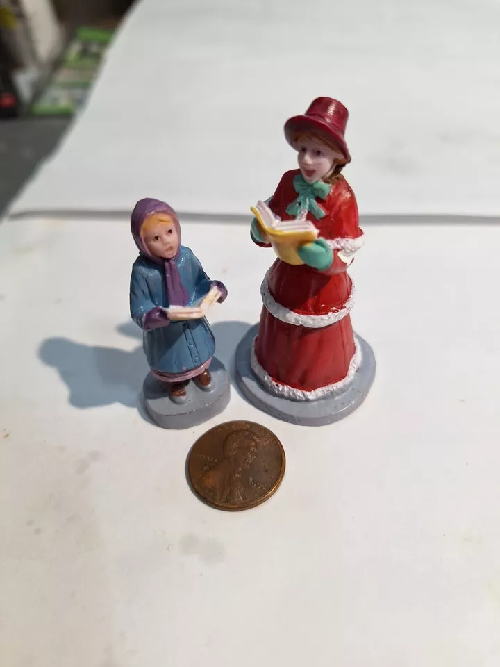 Christmas village figure Victorian Group Caroling On Tree Decorated Stage Dv126