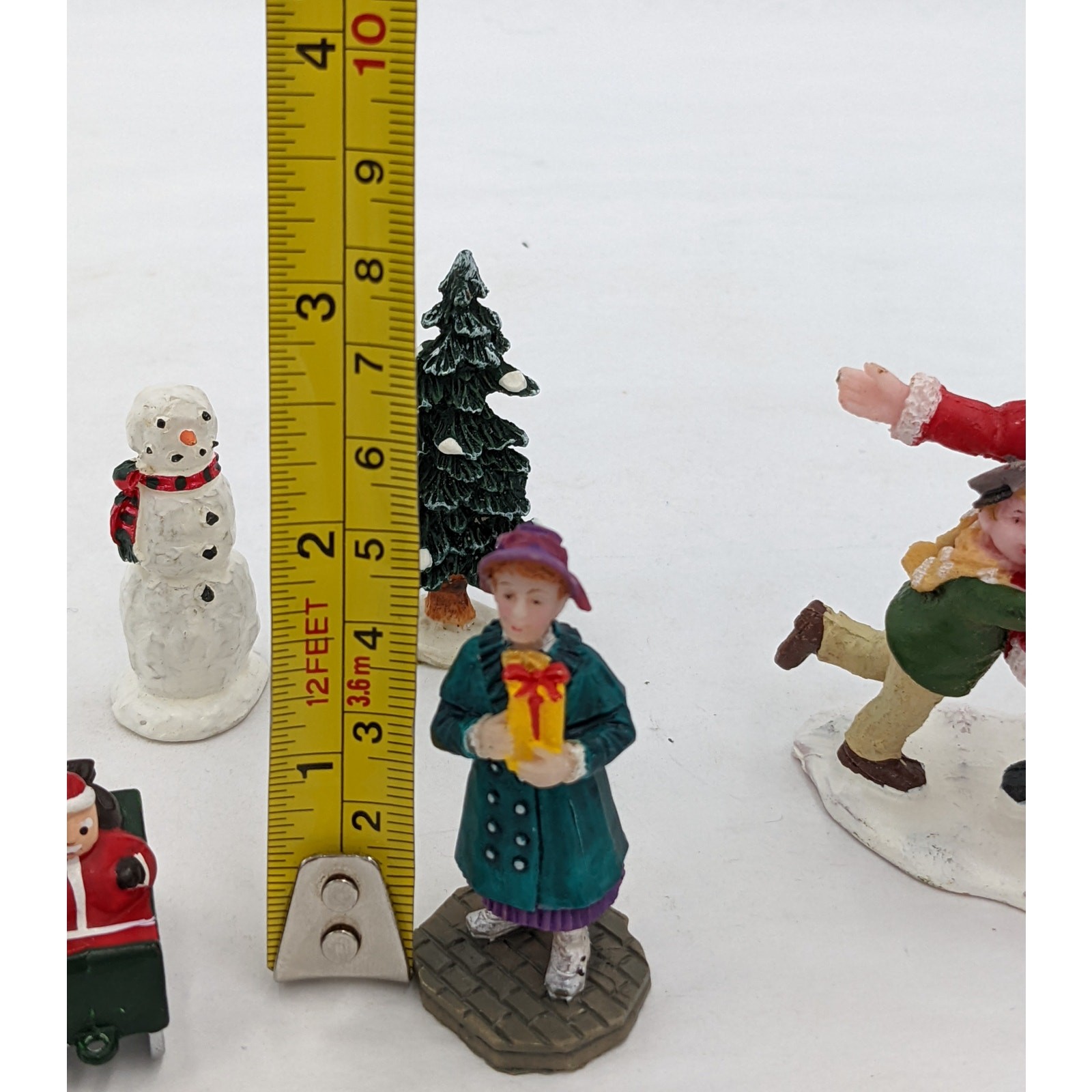 Lemax Christmas Figurines Hugging Santa Claus Tree