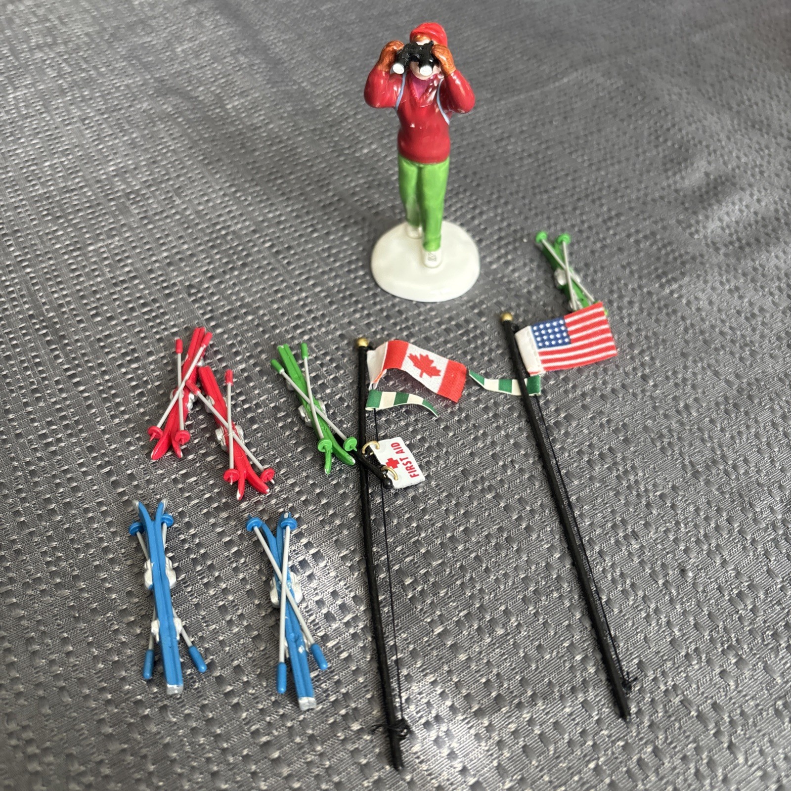 Department 56 Skier With Binoculars, Skis And Flags
