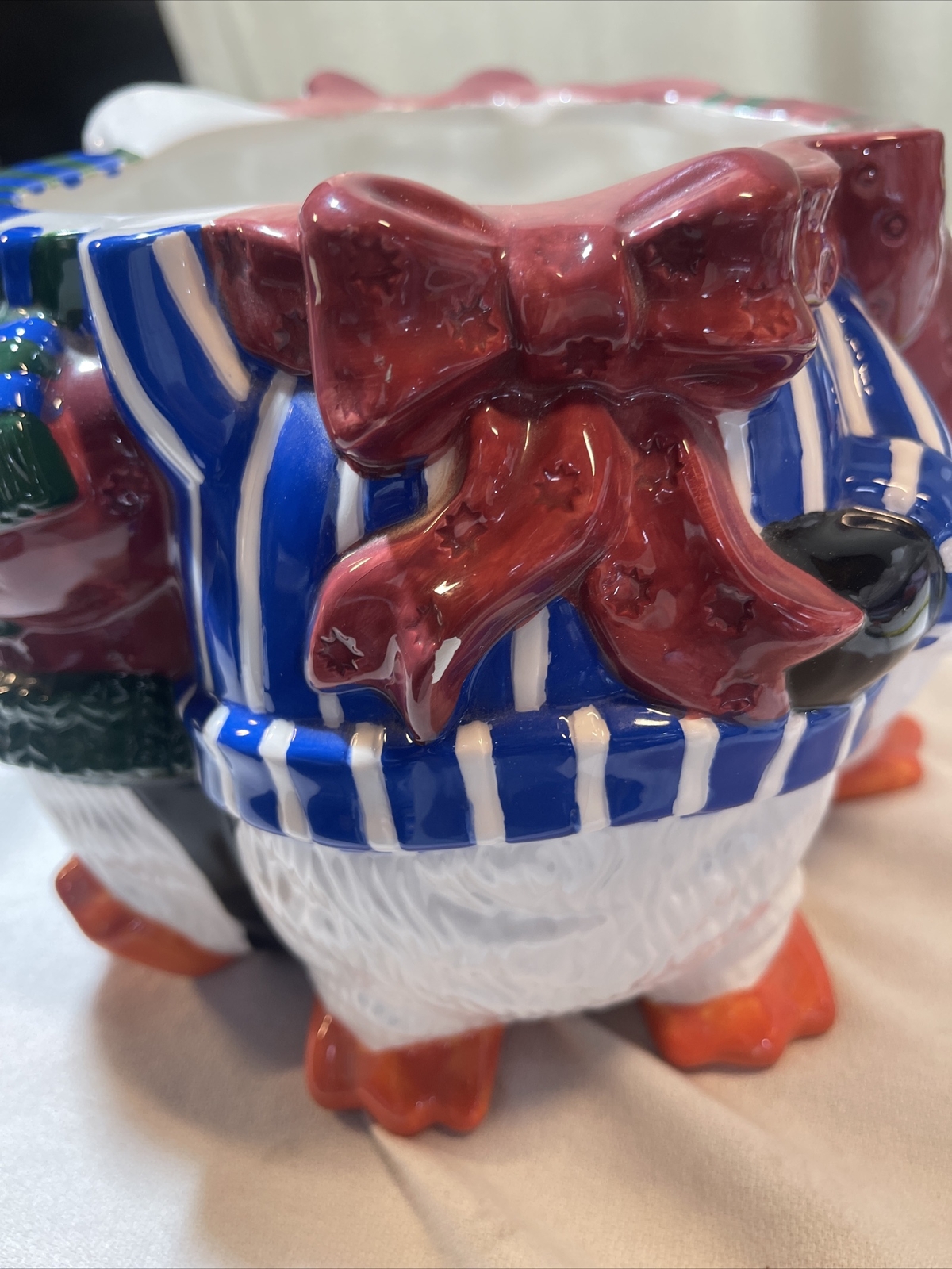 Christmas collectible 4 penguins Sold As Picture