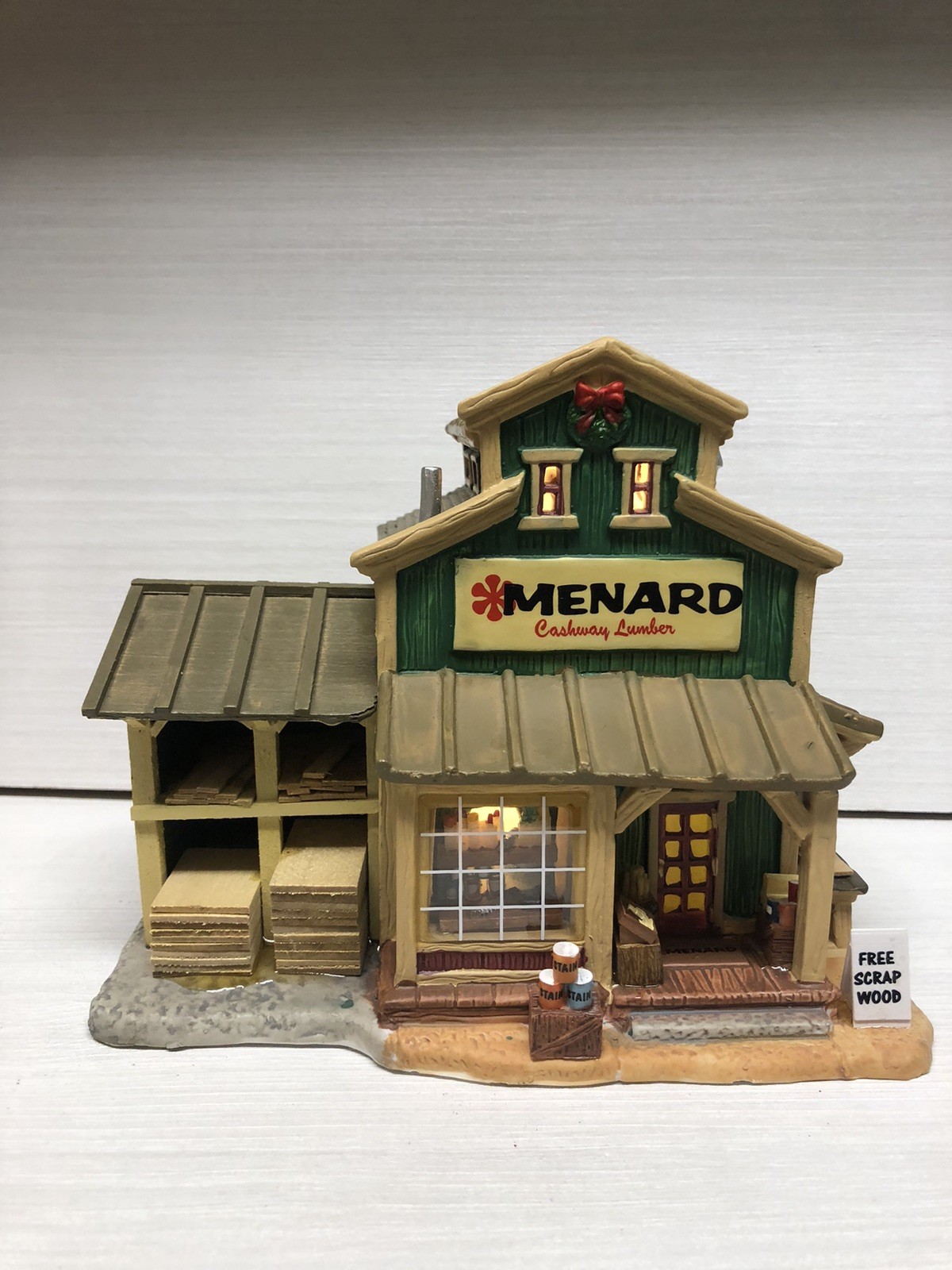 2005 LEMAX Harvest Crossing Lighted “MENARD CASHWAY LUMBER” #55325