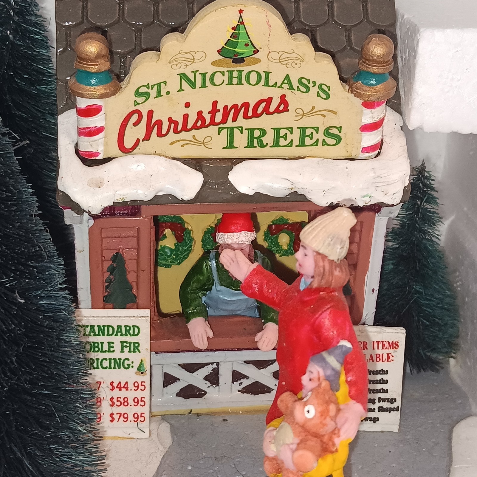 LEMAX St. Nicholas’s Tree Lot 3D Village Family Christmas Scene