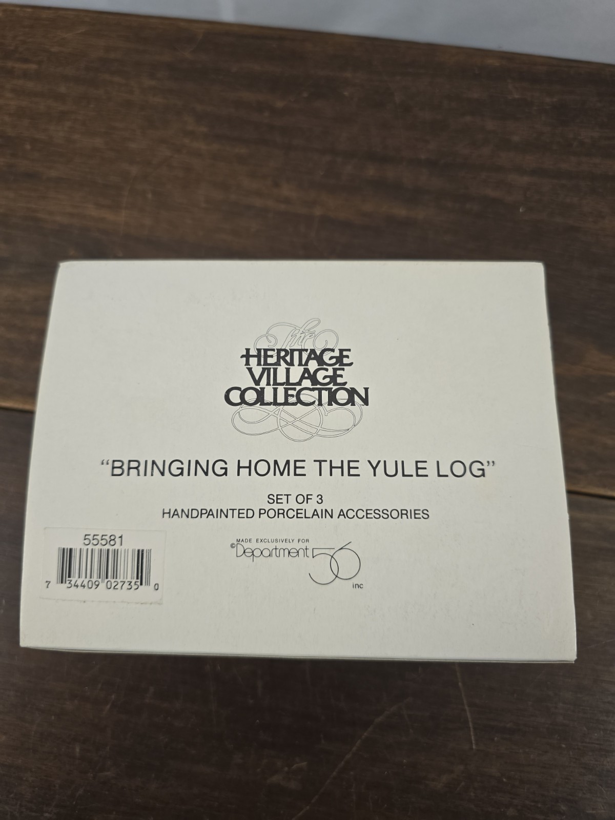 NIB Dept 56 The Heritage Village Collection “Bringing The Yule Log” Figurines
