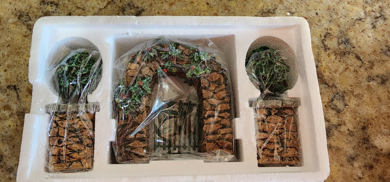 Dept 56 Village Accessories – Stone Corner Posts with Holly Tree and Archway