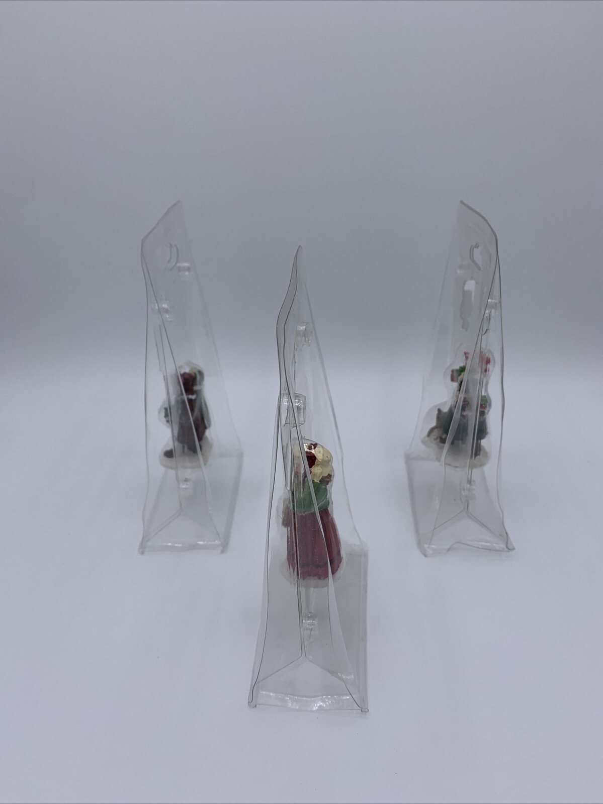 Lot of 3 Unbranded Christmas Village Figurines Tallest is 2.5 inches