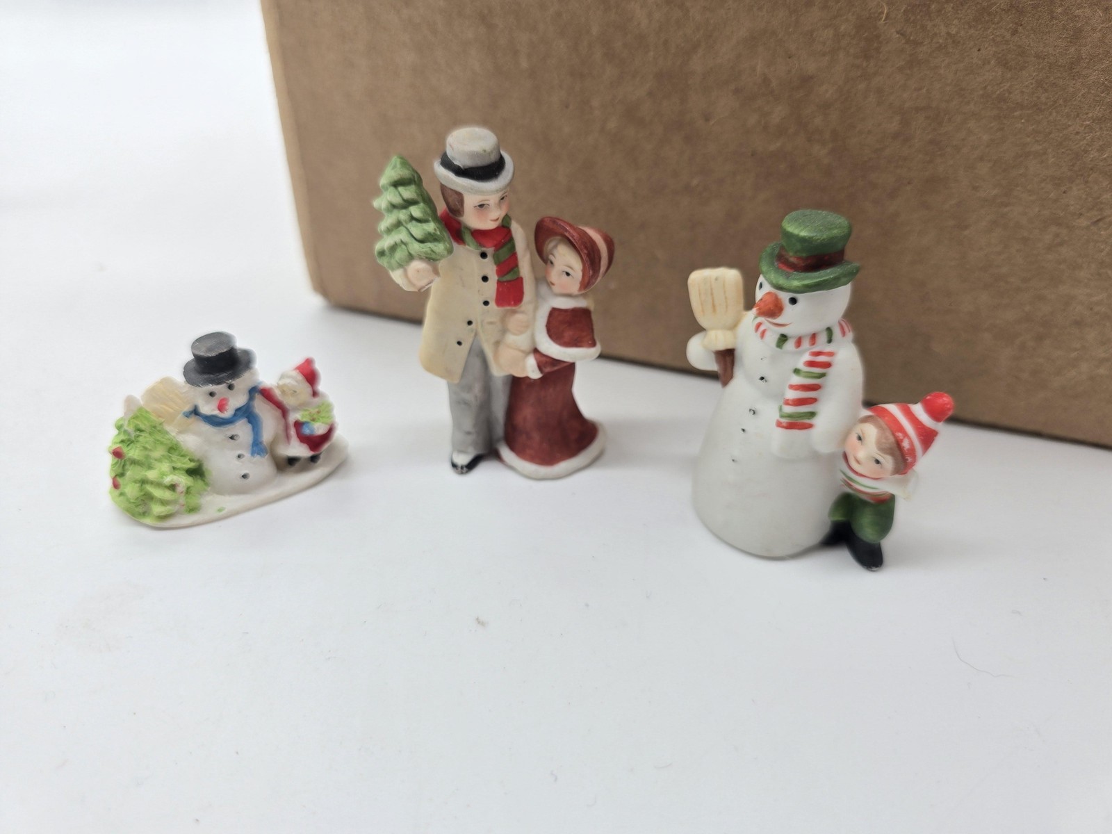 Unmarked Christmas Village Resin Figures Set 4 Snowmen Tree Flag Patriotic Decor