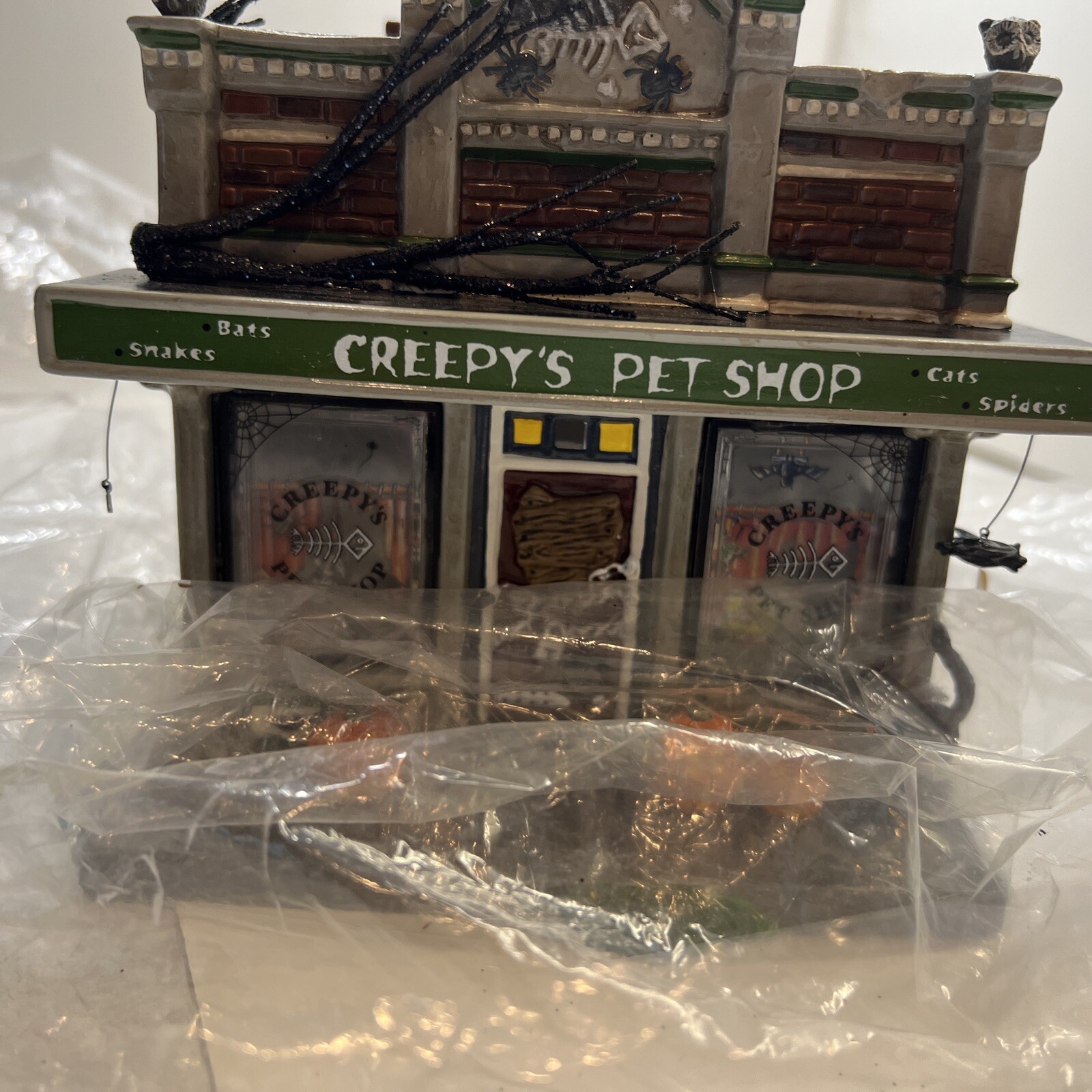 Department 56 Creepy’s Pet Shop 20.88569 Set of 4 Time To Celebrate