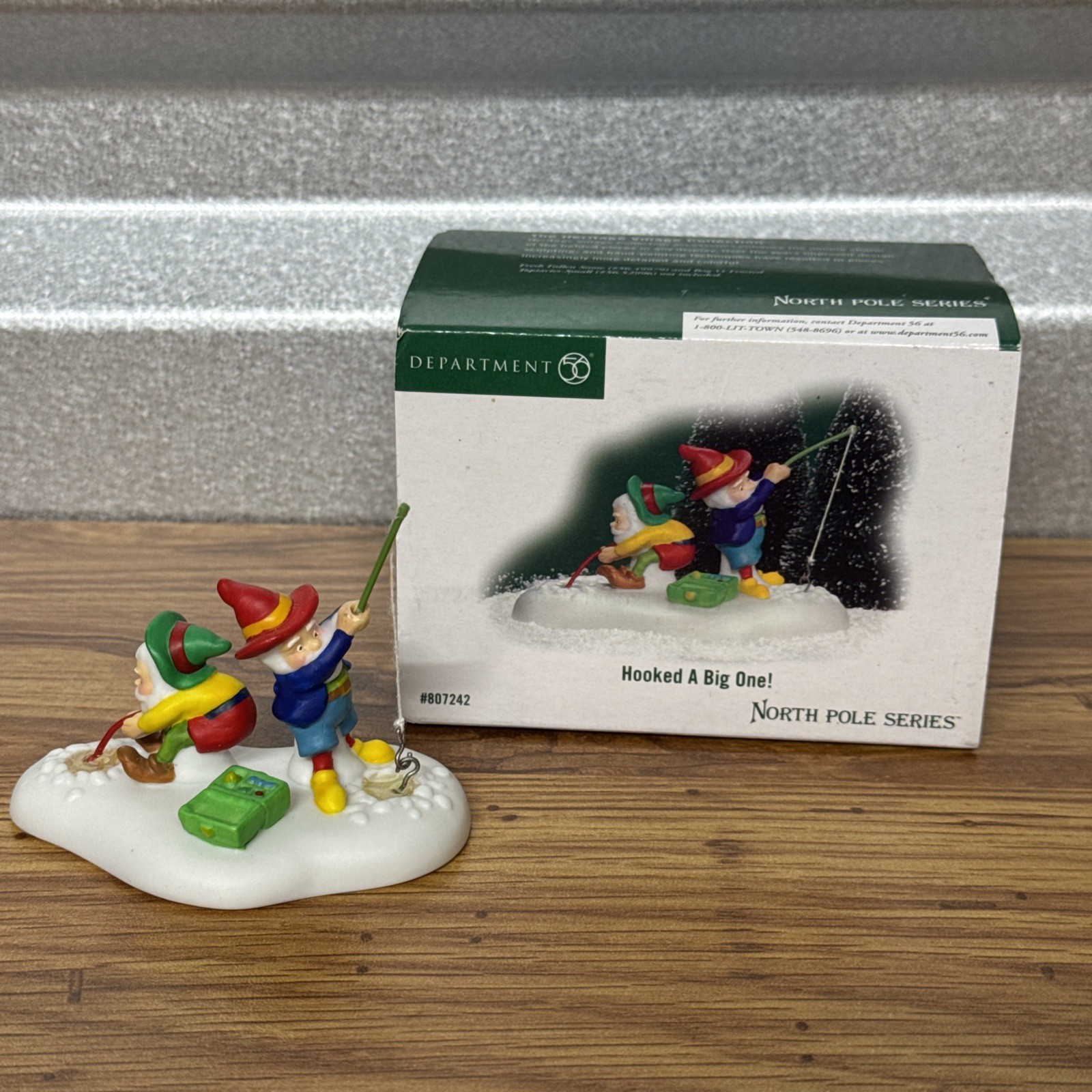 Dept 56 “Hooked A Big One” w Box 807242 North Pole Series Village Ice Fishing