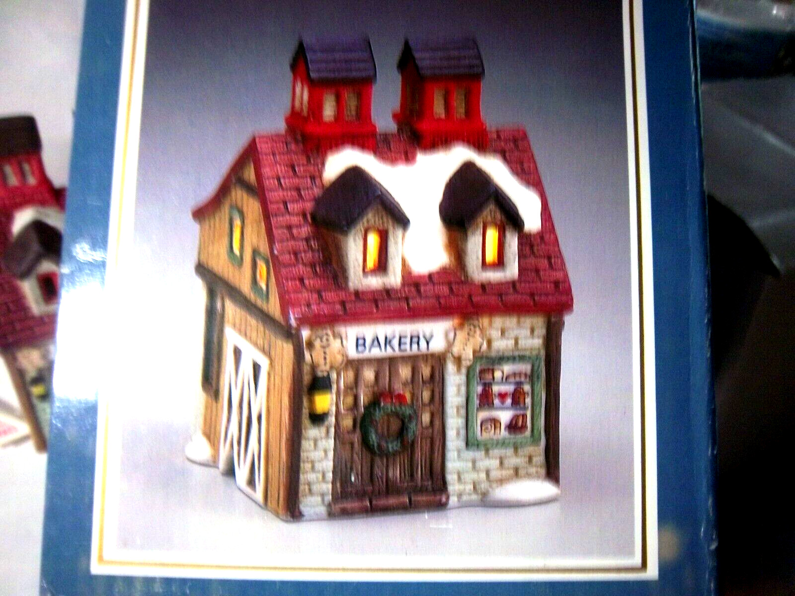 Lighted Xmas “Bakery”shop with dormers-Window displays breads,cake ,cookies-
