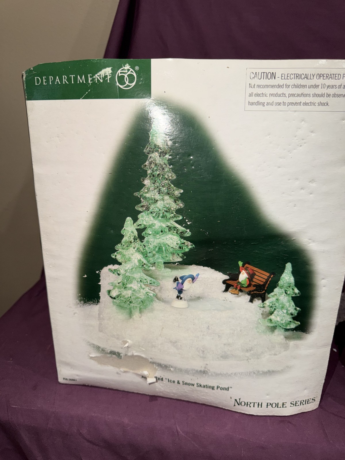 Department 56 Animated “Ice & Snow Skating Pond” Skater Bench