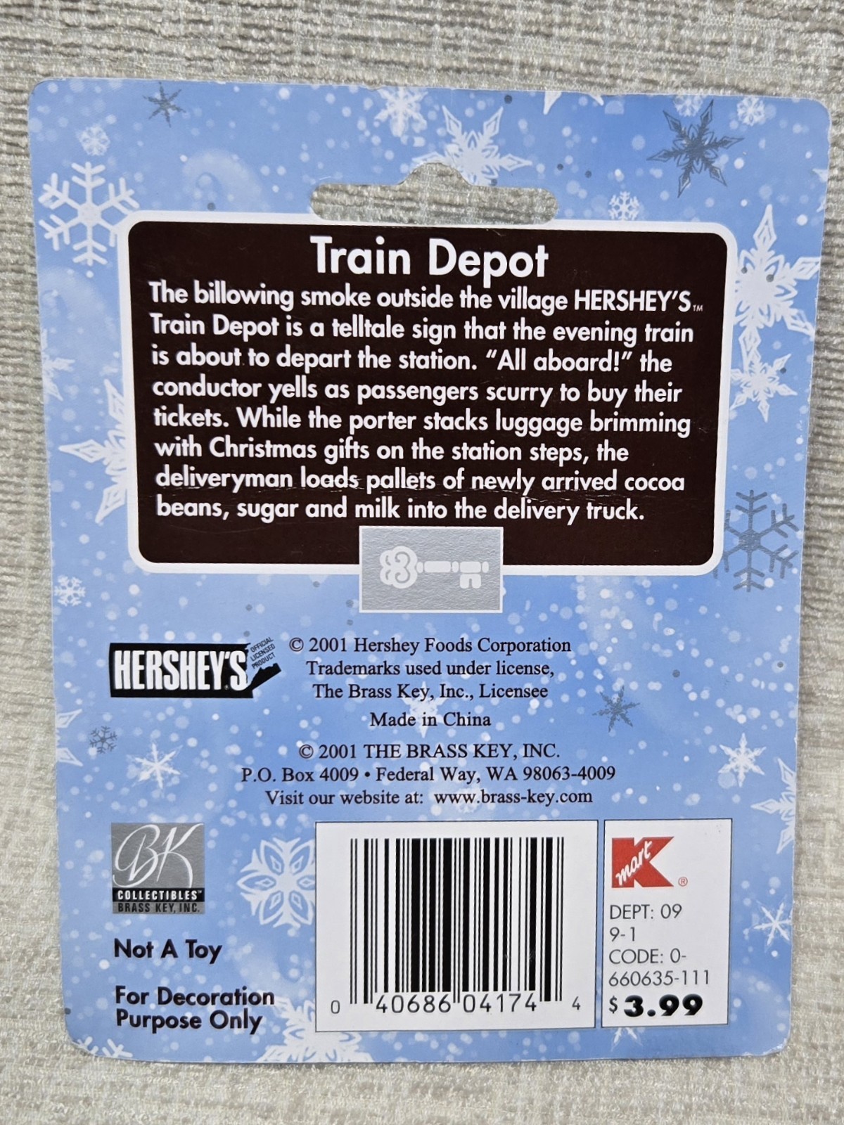 Hershey’s Holiday Village-3 Pieces-Train Porter, Taking a Break, and Packages