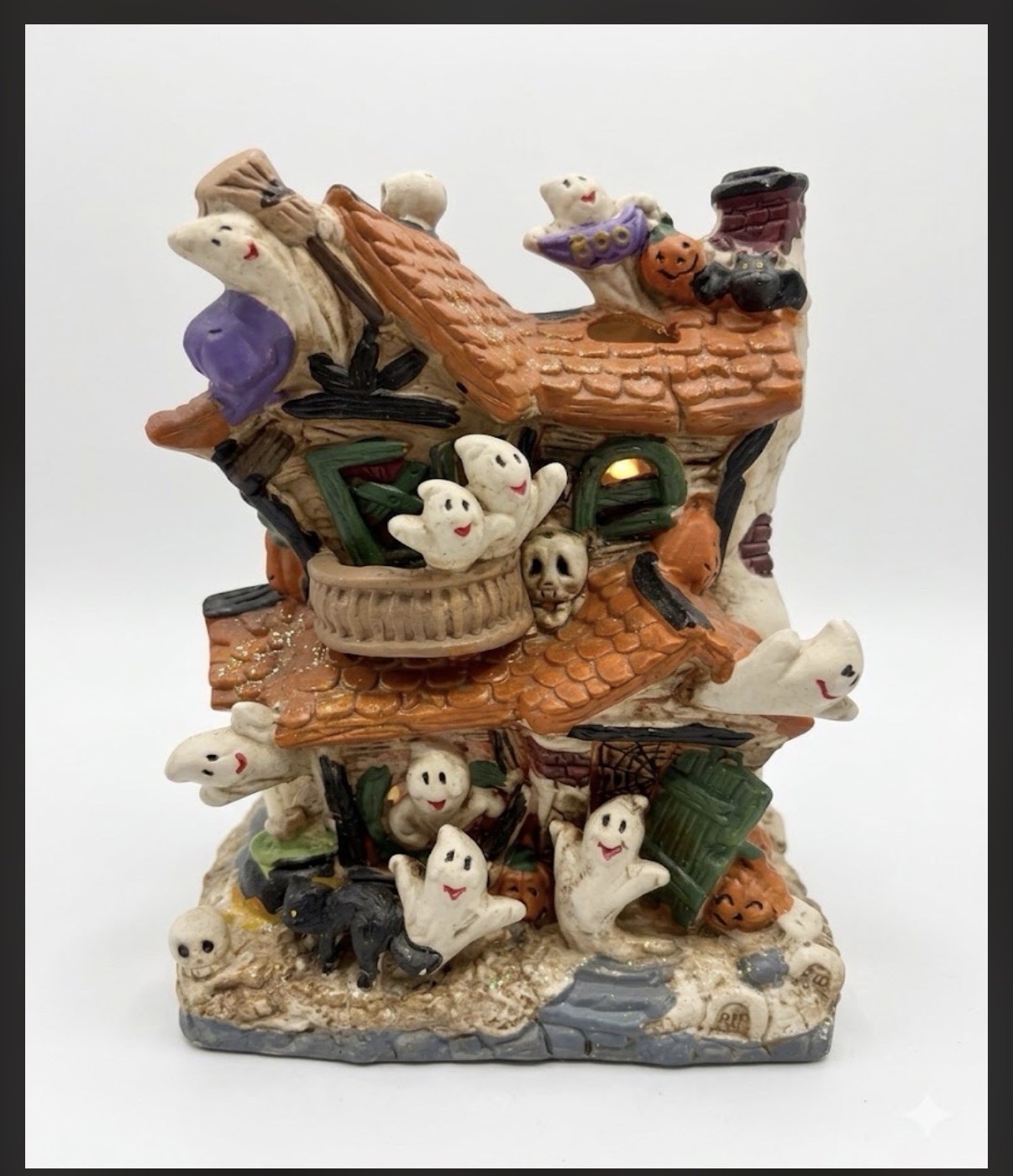 Illuminated Ceramic Haunted House Halloween Decoration with Ghosts