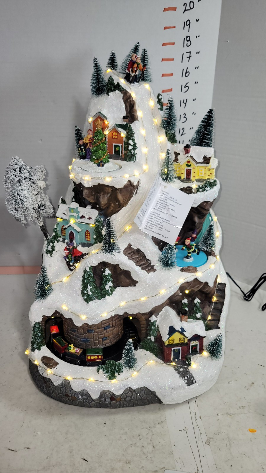 Alpine Corporation 18″H Christmas LED Village with Train Illuminated/Music