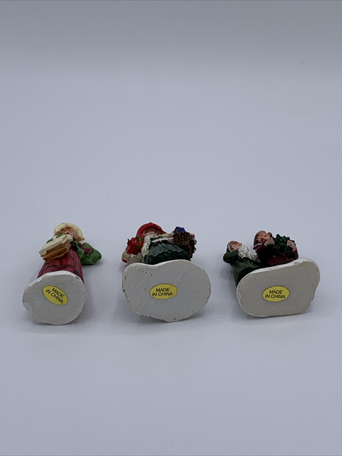 Lot of 3 Unbranded Christmas Village Figurines Tallest is 2.5 inches