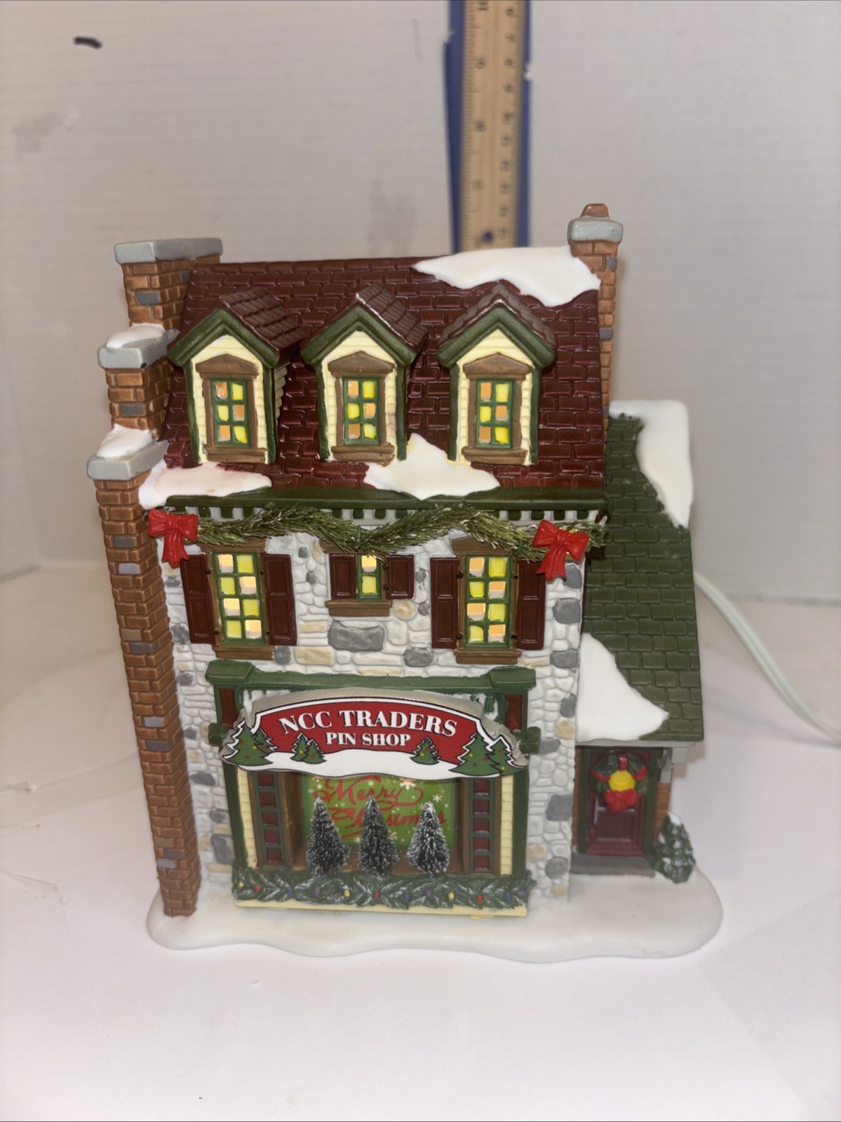 Dept 56 “NCC Traders Pin Shop” 2008 #804011