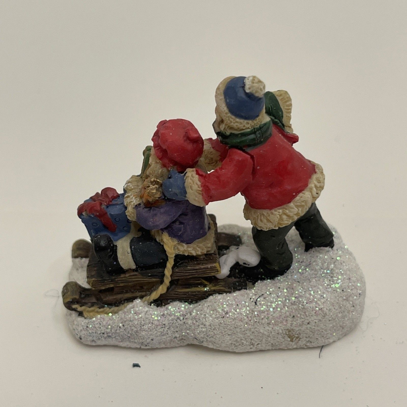Celebrations Christmas Village Snowy 2 Kids Sledding 2 Inches Tall Glittery Snow