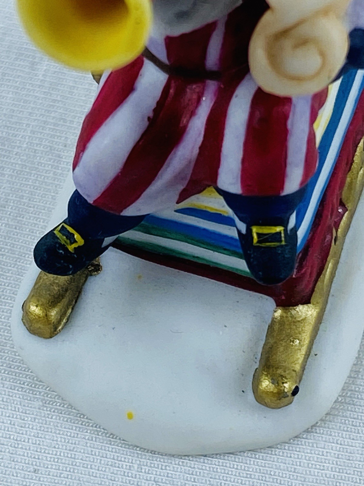 Department 56 H.V. Series Santa Claus In Red & White Striped Pajamas On A Sled