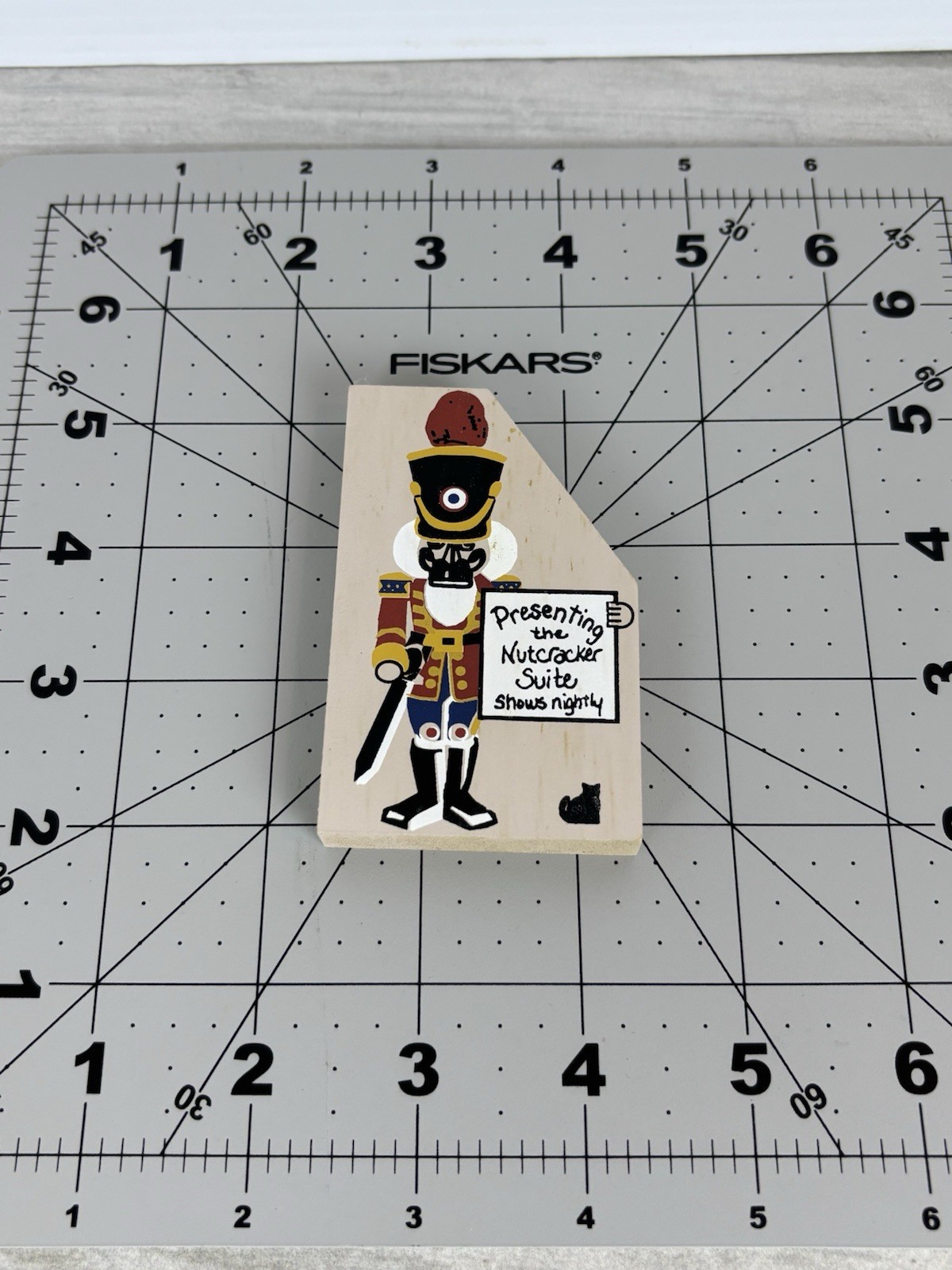 The Cat’s Meow Village Wooden Soldier Presenting The Nutcracker Suite Sign