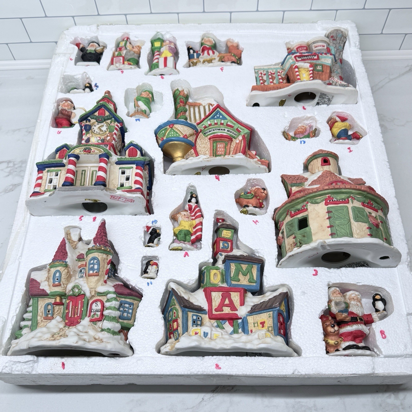 Vintage Grandeur Noel Santa’s Village 23 Piece Illuminated Porcelain Set