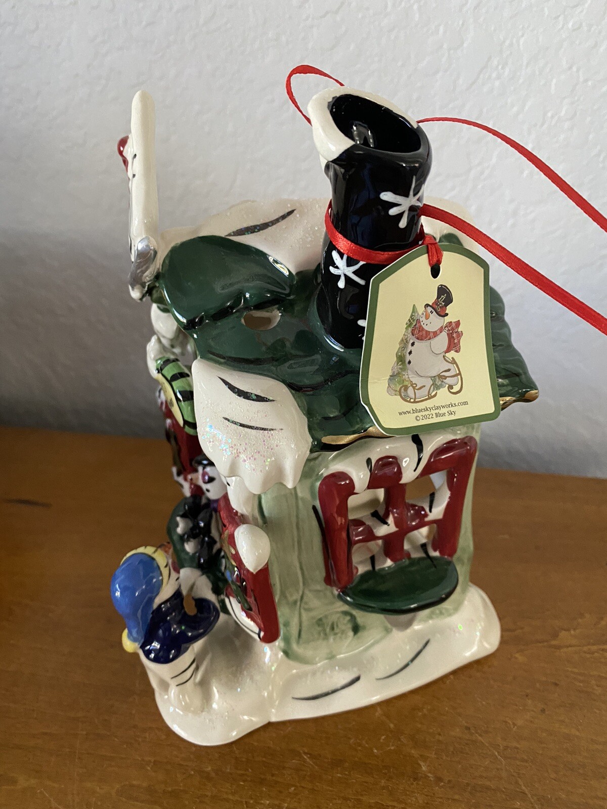 Blue Sky Clayworks “FROSTY’S SKATE RENTAL” CHRISTMAS T-Lite Candle House NWT
