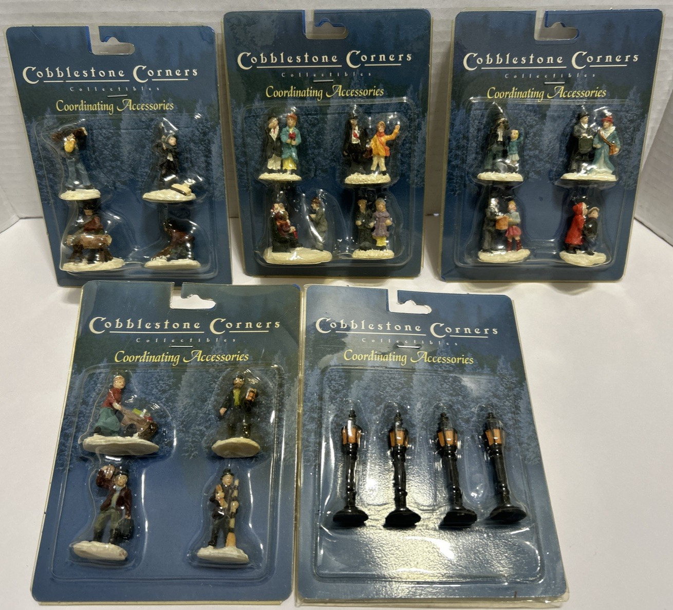 5 NEW Cobblestone Corners Christmas Miniatures Winter Village Sets People Santa