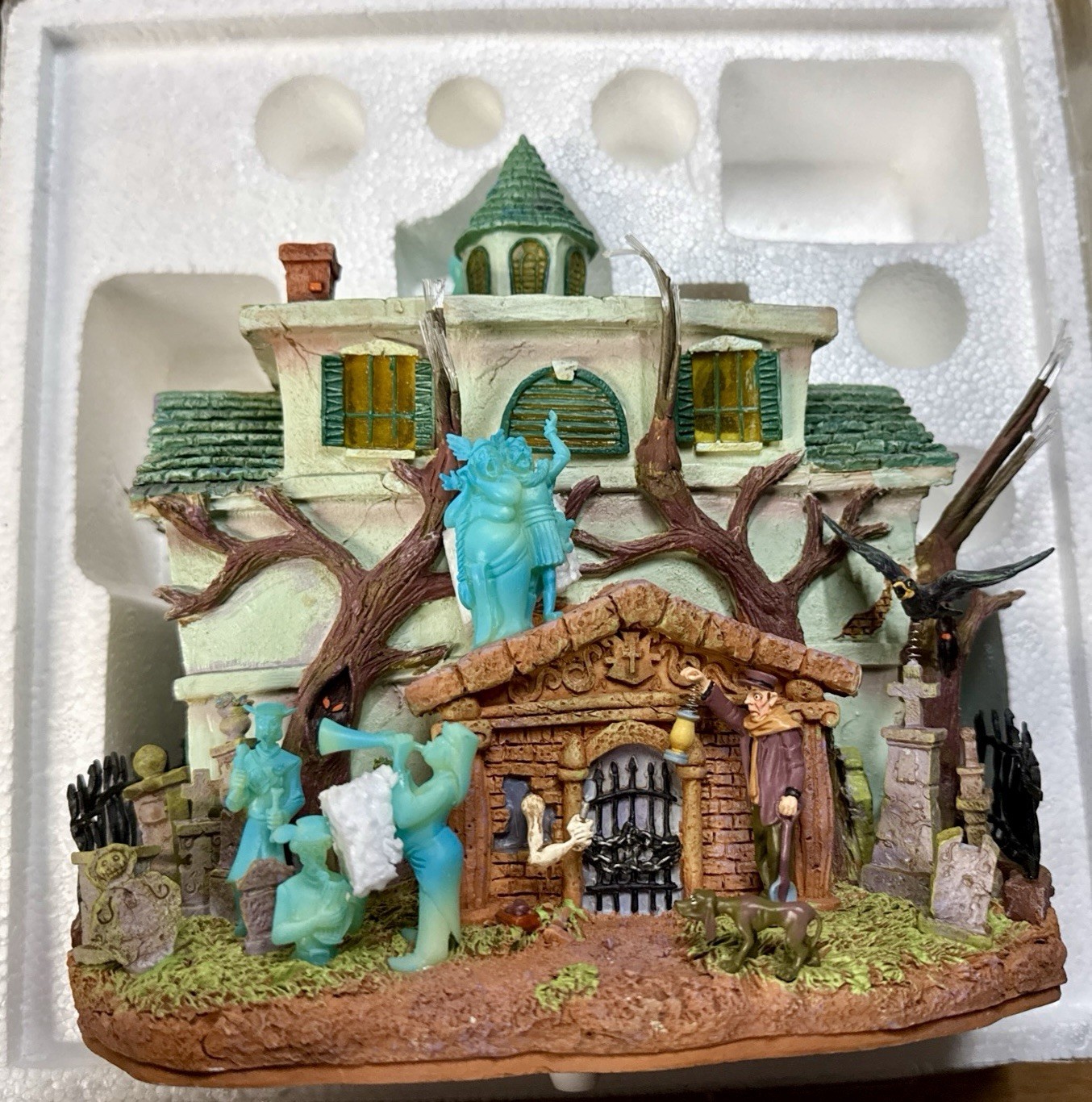 Disney Parks Haunted Mansion fiber optic light-up house “short in 1 tree light.”