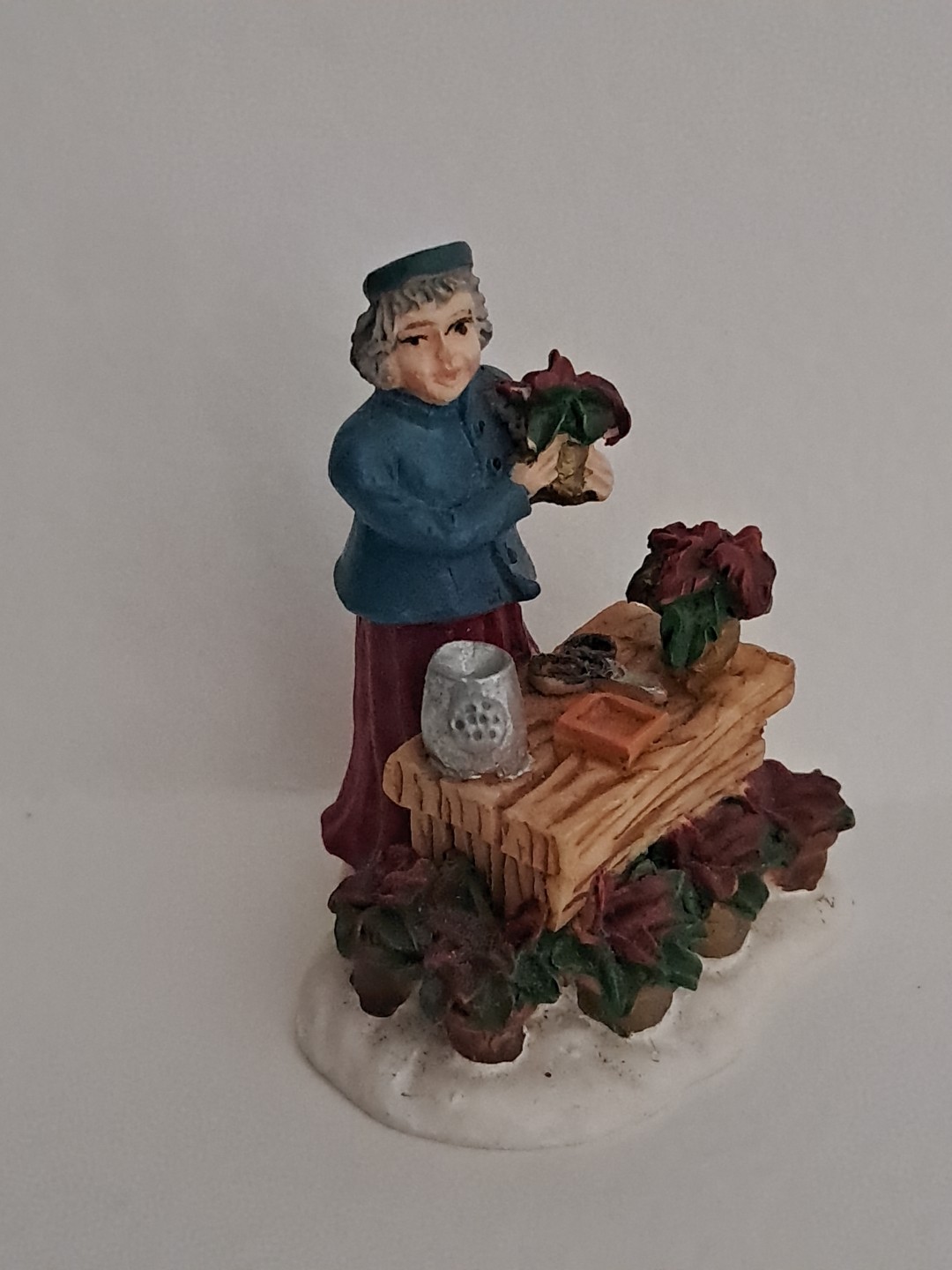 Grandeur Noel Village Lady w/Poinsettias Christmas 1999 Figure Replacement