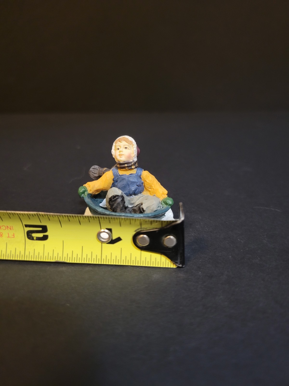 SNS St. Nicholas Square Christmas Village Child Sledding on Saucer