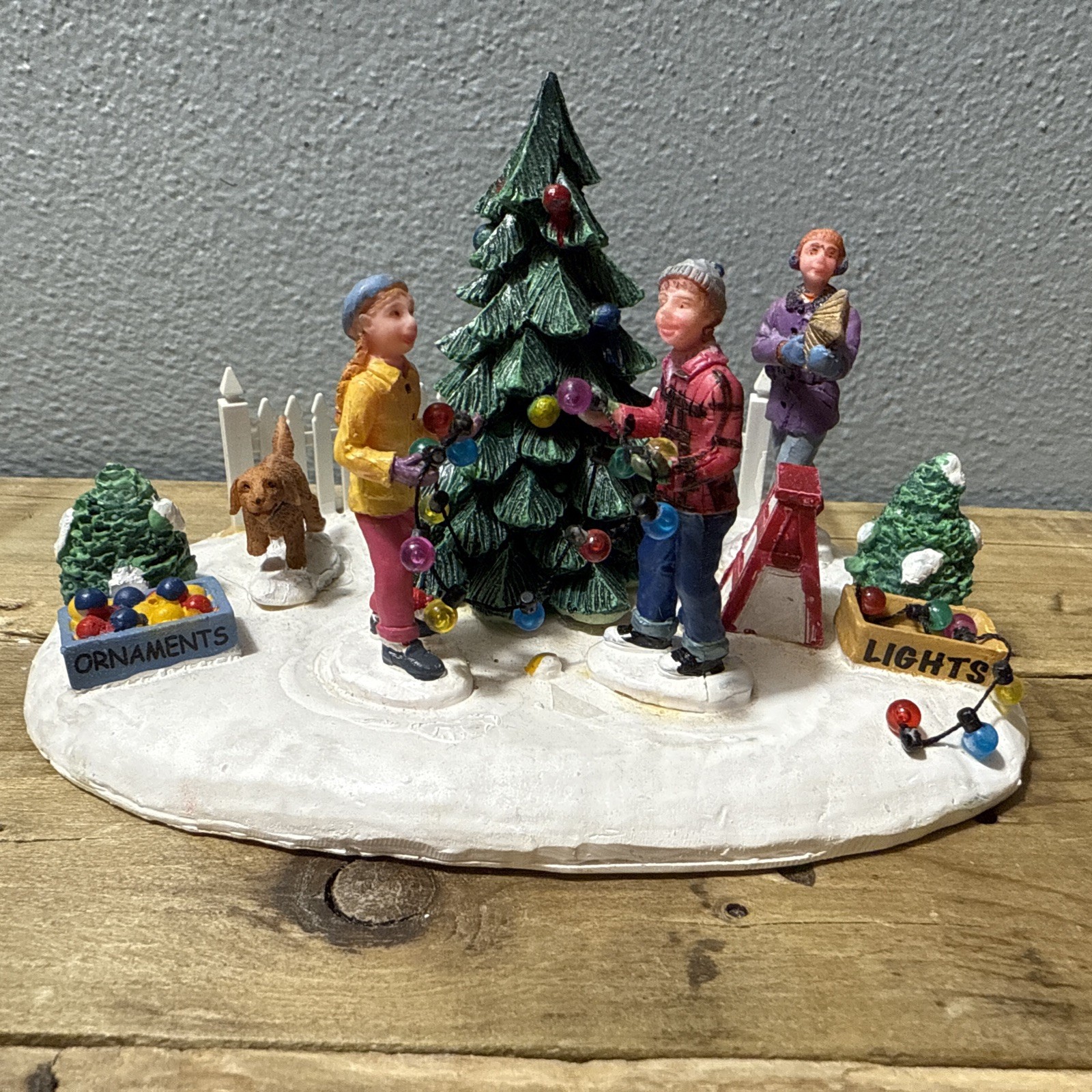 2009 Lemax Christmas Carole Towne Collection: Decorating Front Yard Tree, #94056