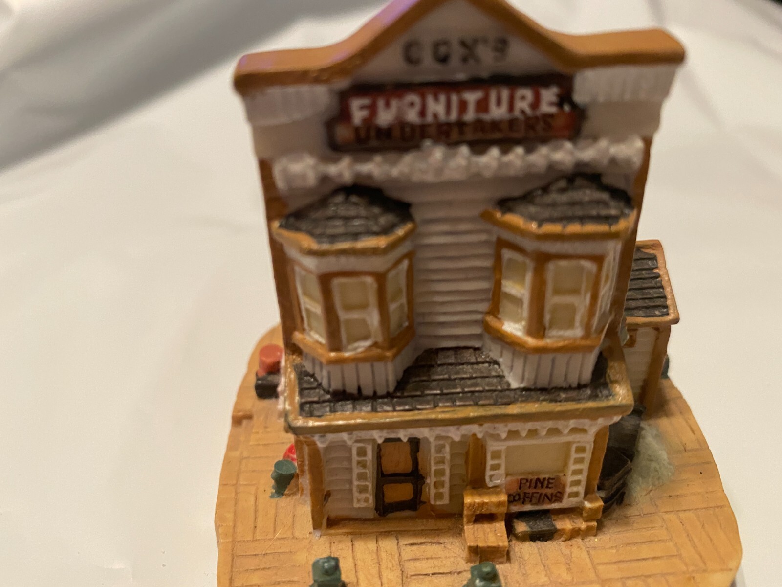 1993 Cox’s Furniture and Undertakers 3″ Village homes and tiny church