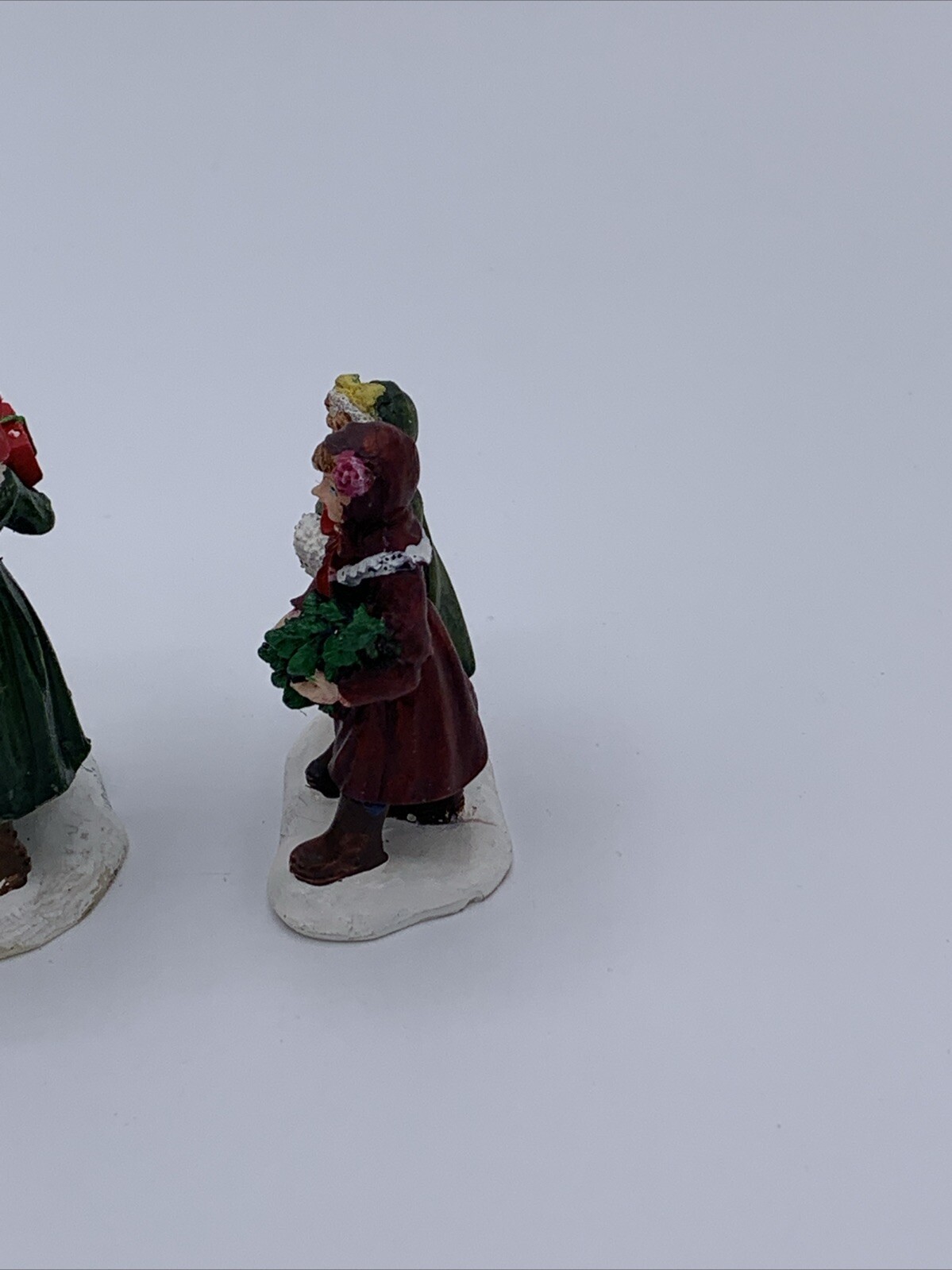 Lot of 3 Unbranded Christmas Village Figurines Tallest is 2.5 inches
