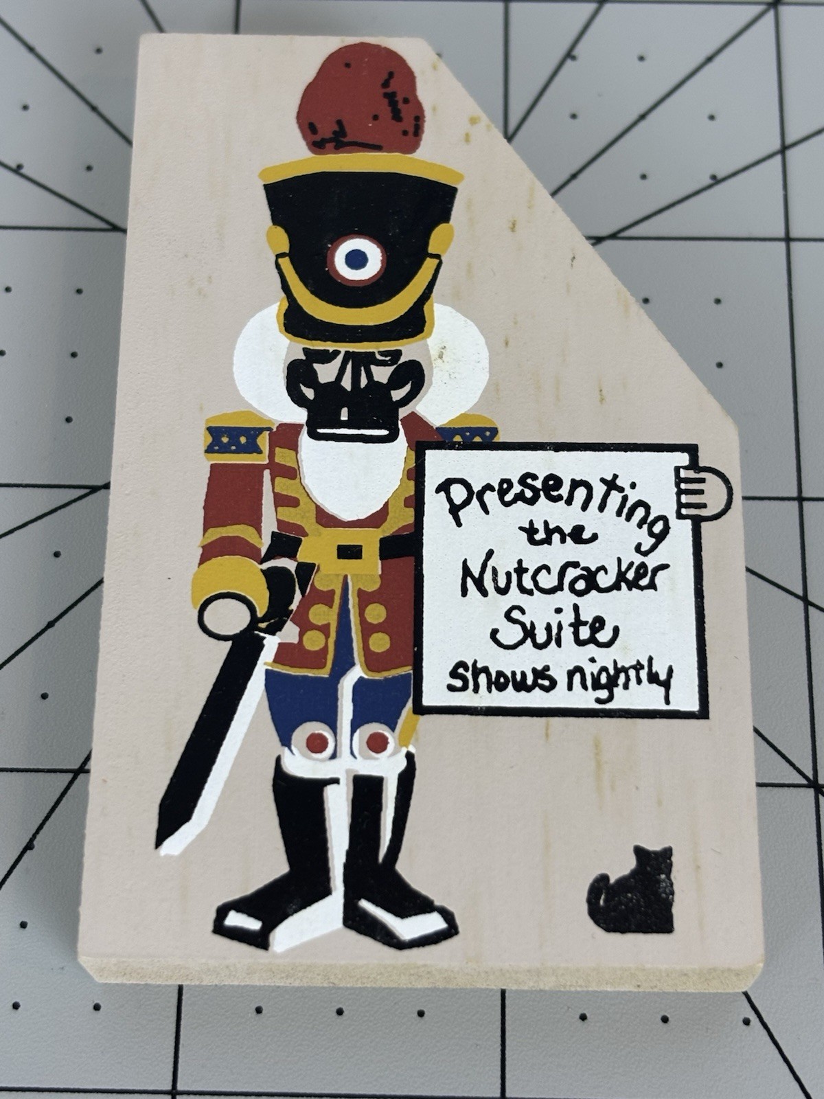 The Cat’s Meow Village Wooden Soldier Presenting The Nutcracker Suite Sign